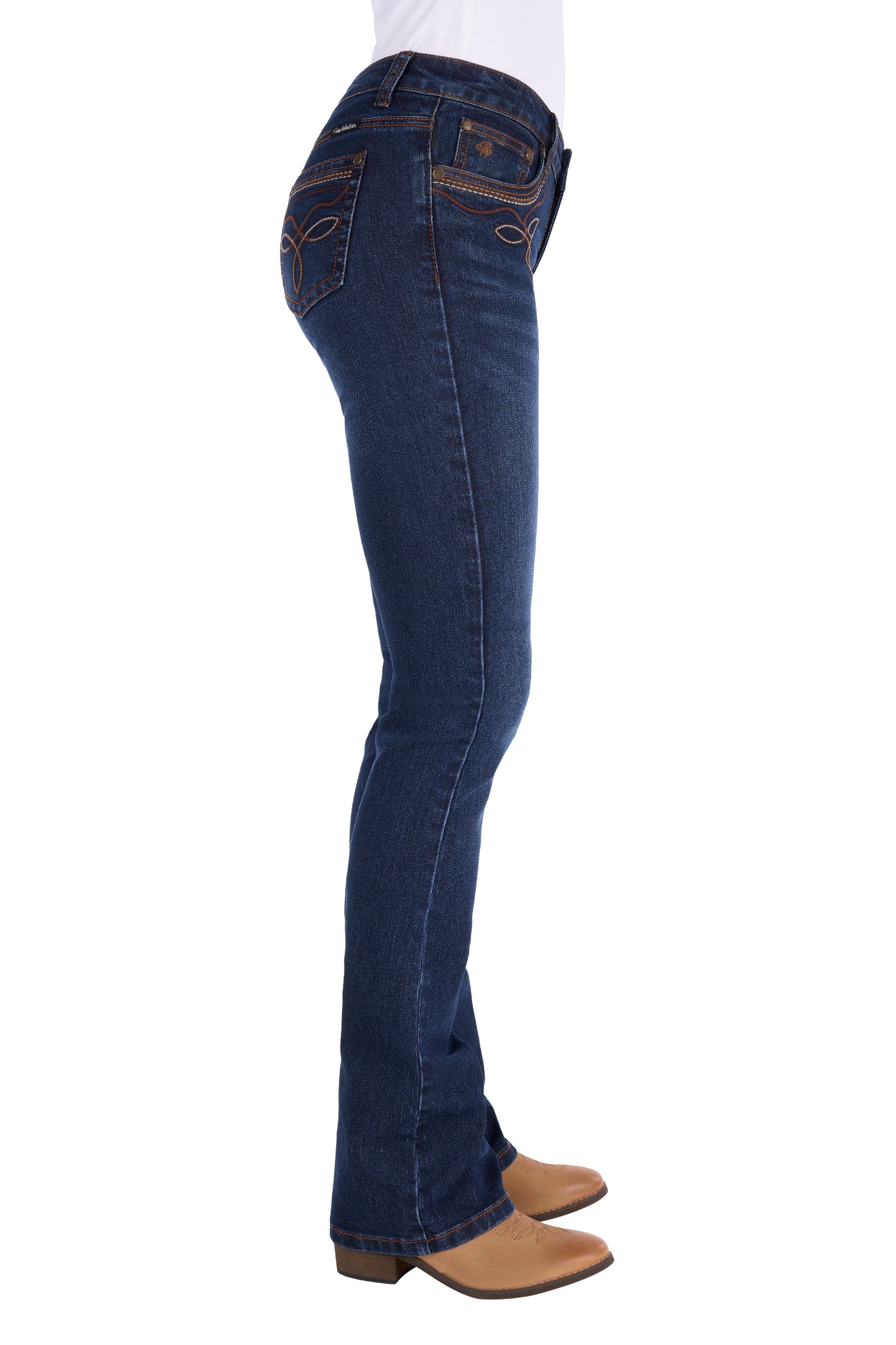 Side profile of a person wearing dark blue western flare jeans and tan cowboy boots against a plain white background.