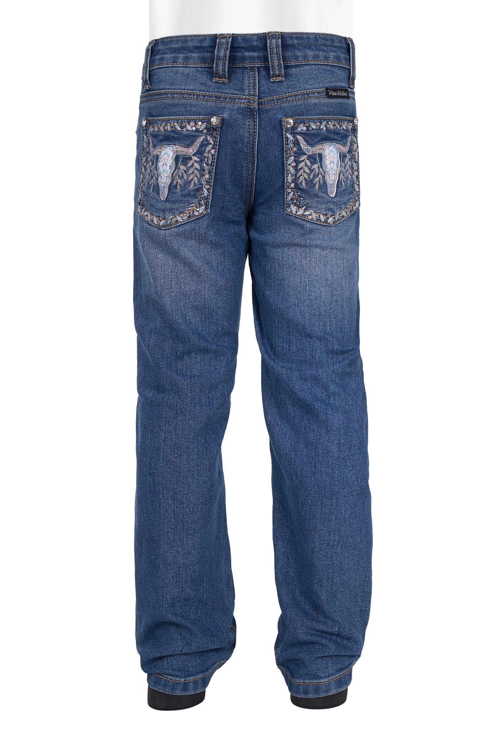 Blue jeans with embroidered designs on the pockets against a white background