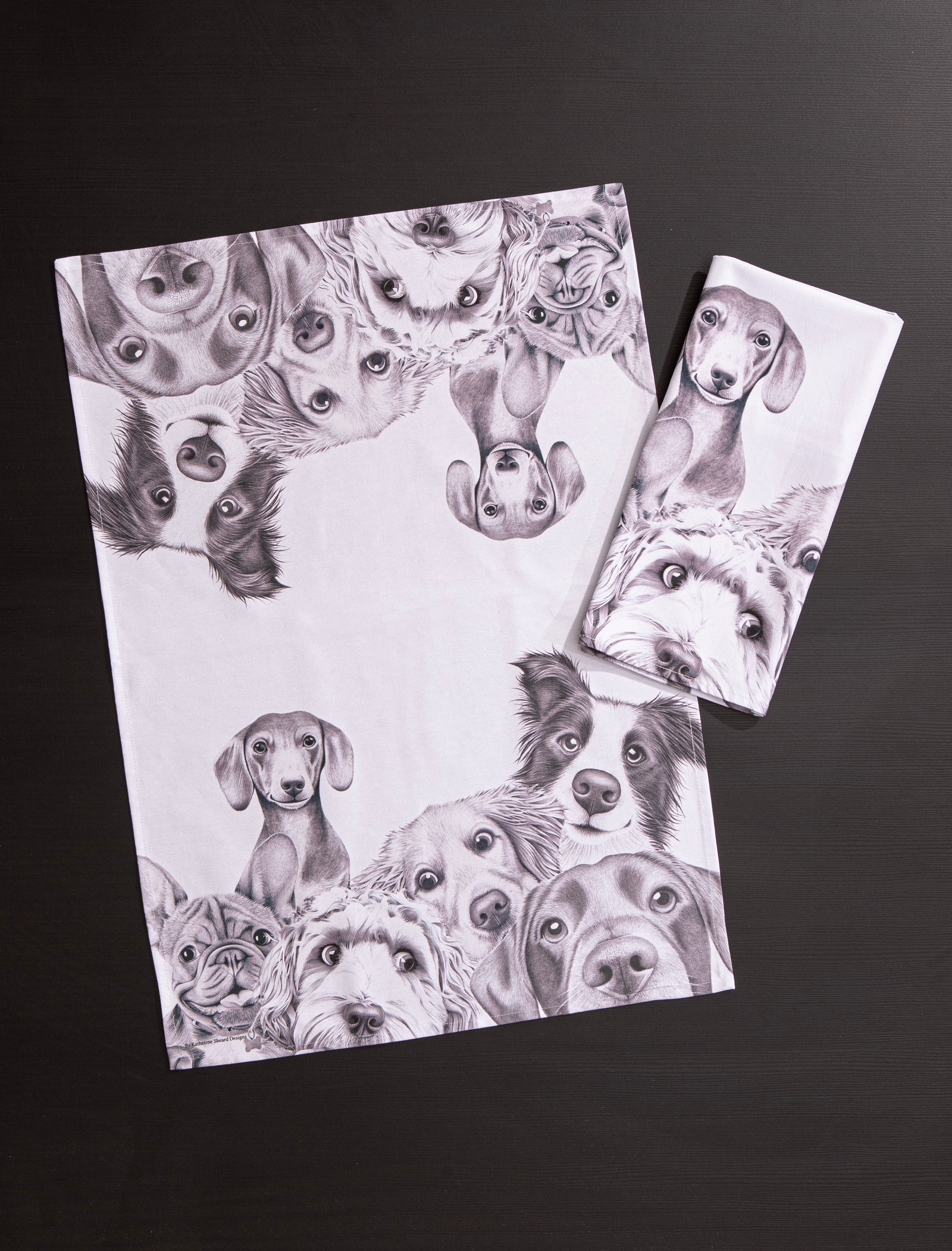 Set of two greeting cards with black and white illustrations of dogs on a dark background