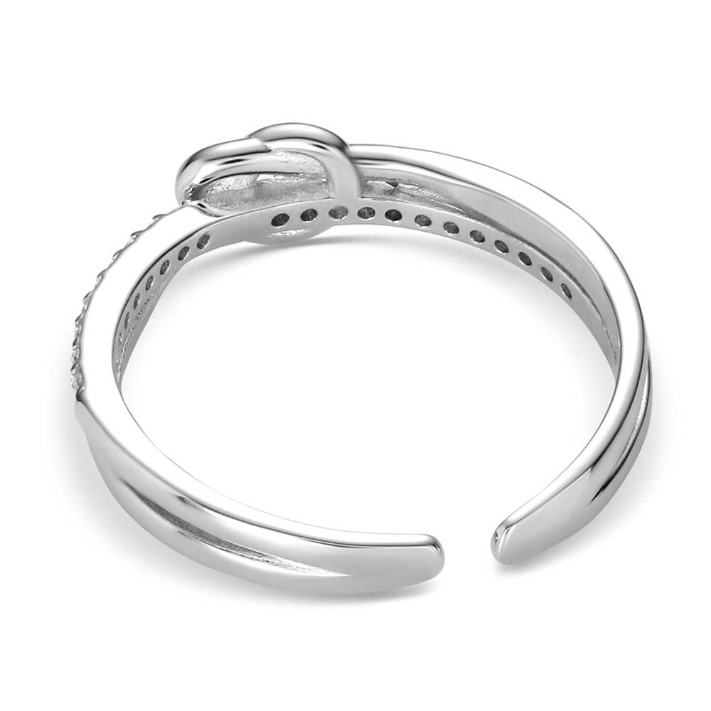 Montana Silversmith the Tied to You Ring features two elegant strands, one being smooth silver and the other adorned with sparkling cubic zirconia crystals that join to form a beautifully tied knot at the center.
