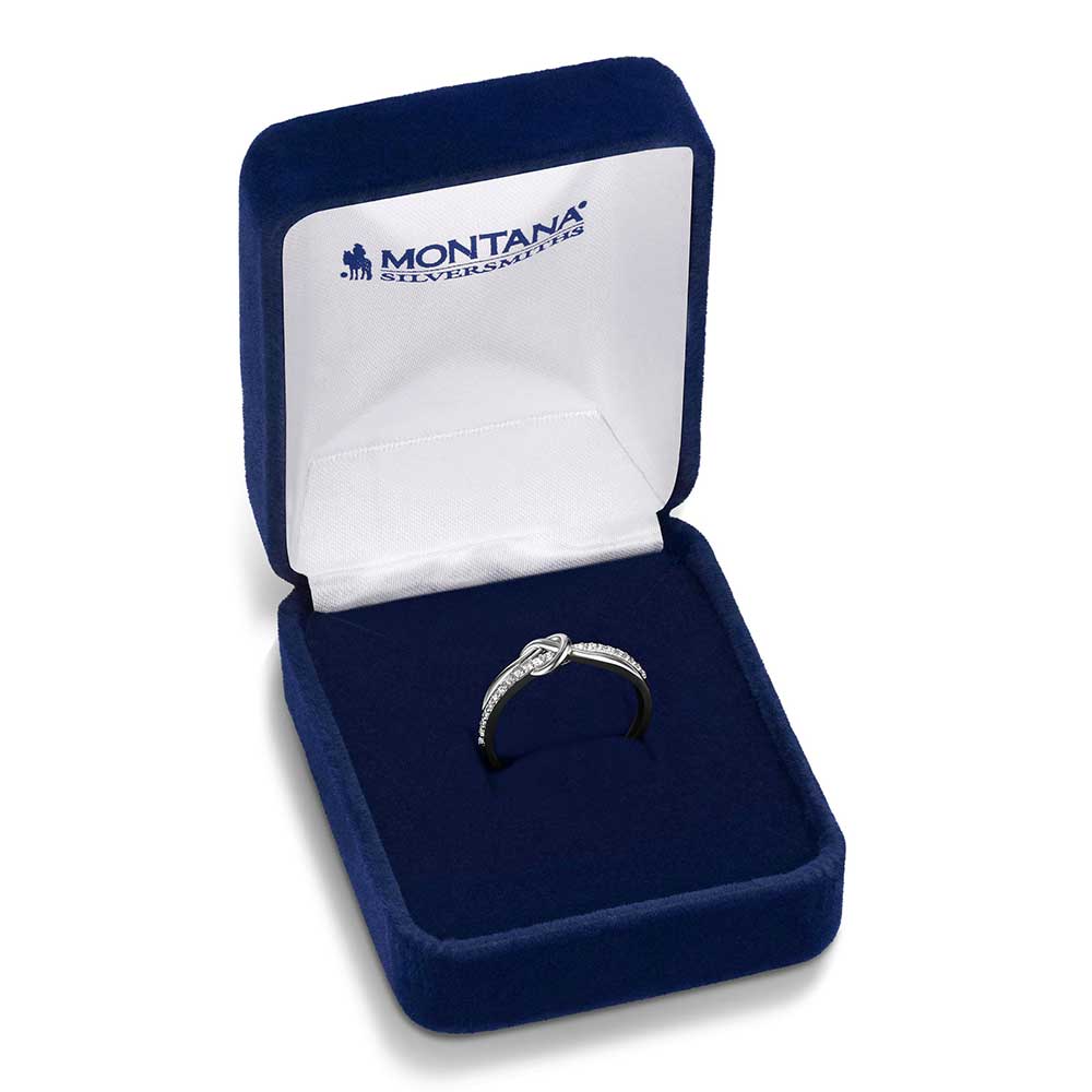 Montana Silversmith the Tied to You Ring features two elegant strands, one being smooth silver and the other adorned with sparkling cubic zirconia crystals that join to form a beautifully tied knot at the center.