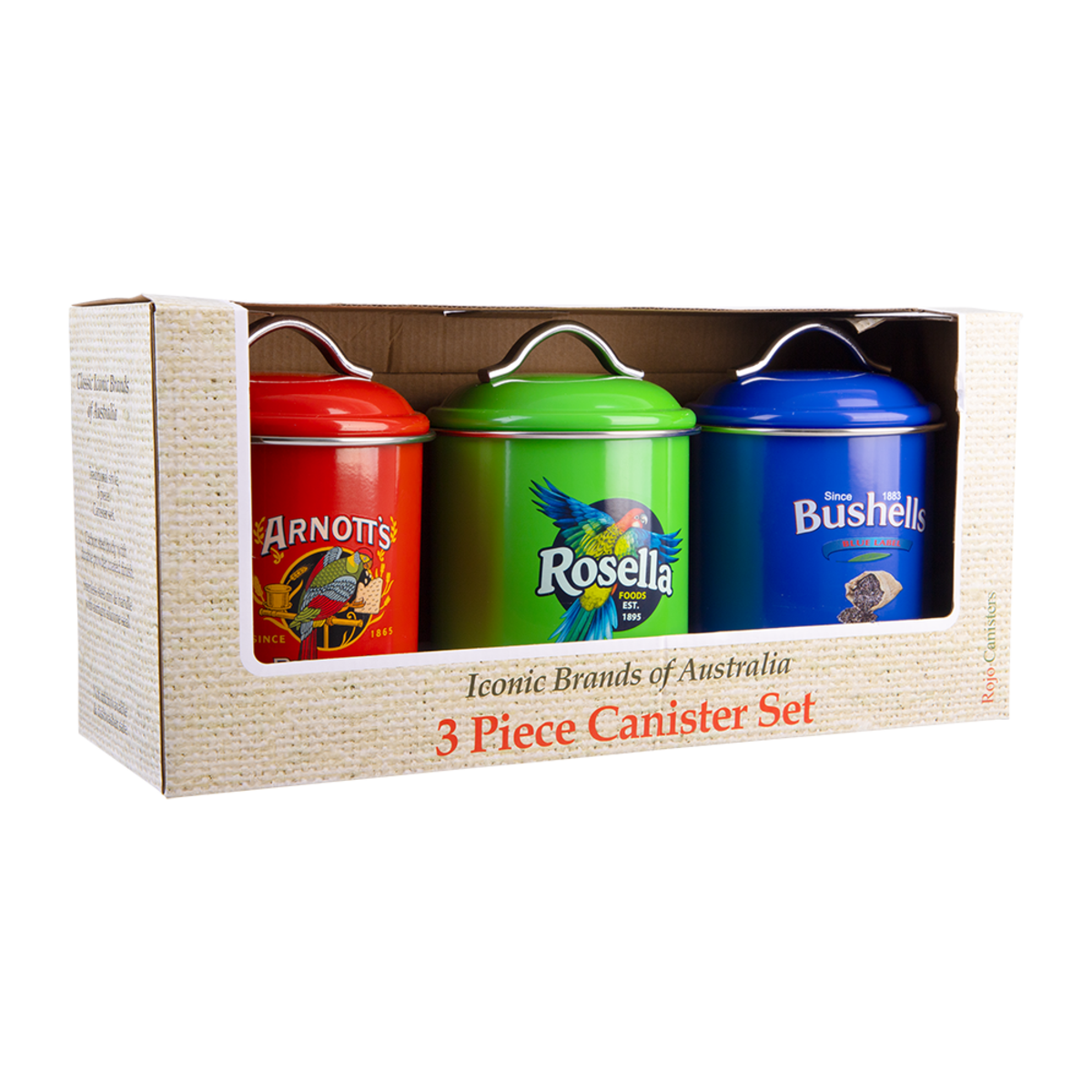 A 3-piece canister set in its original retail packaging, featuring a red canister labeled 'Arnotts', a green canister labeled 'Rosella', and a blue canister labeled 'Bushells'. The set is presented in a beige textured cardboard box with a clear window.