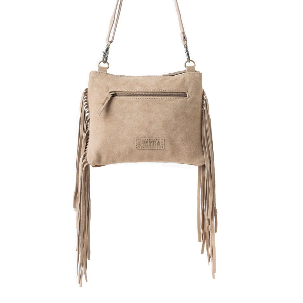 Mesa Rebel Hairon Western Handbag in Spotted Tan. Beige suede handbag with fringes on a white background