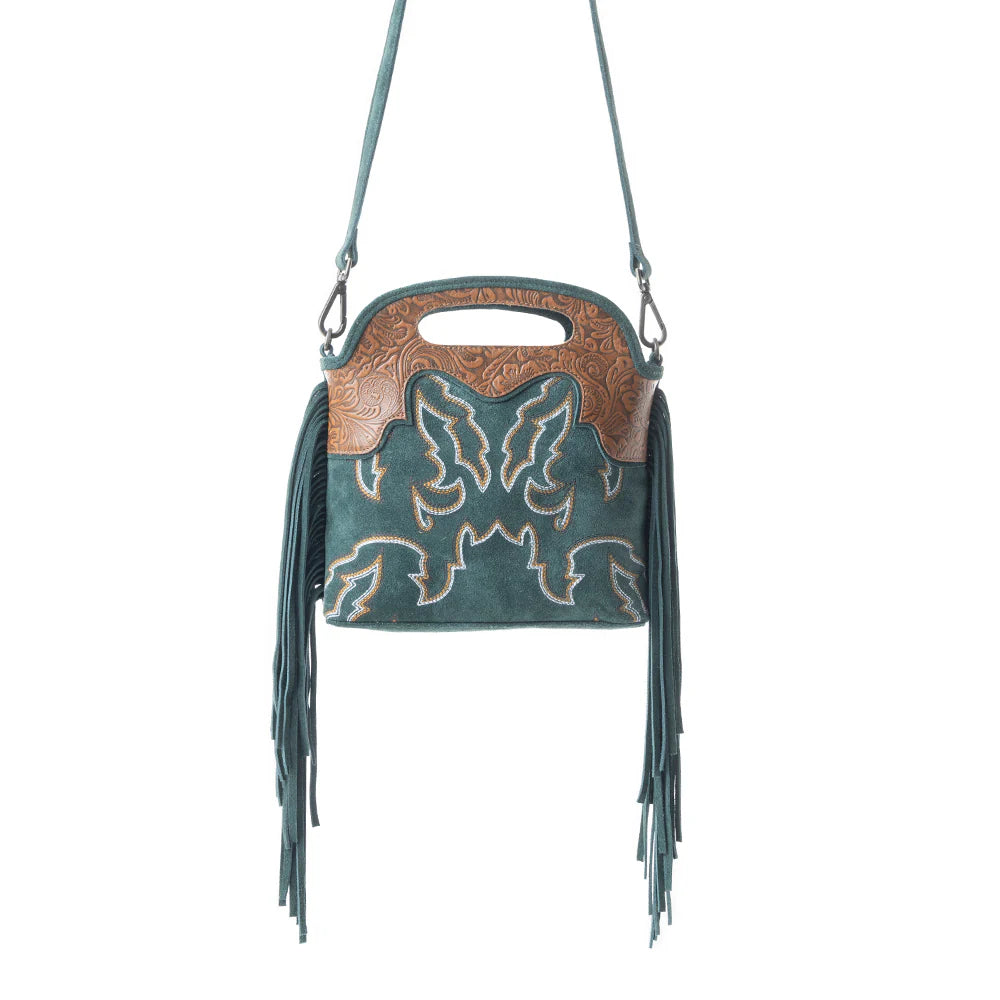 Electric Dessert Shoulder Bag In Green. Green handbag with brown leather accents and fringe on a white background