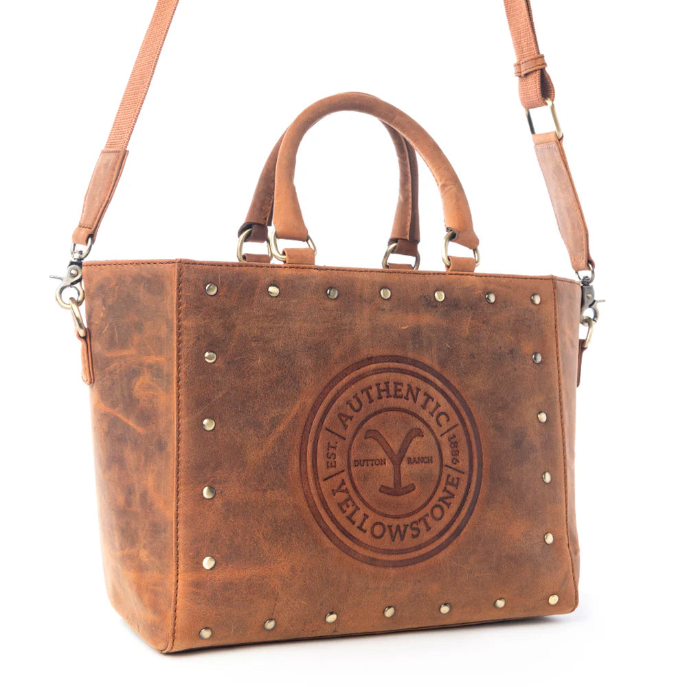 Yellowstone Valley Soul Studded & Embossed Tote Leather Bag in Amber. Brown leather handbag with studded details and Yellowstone logo on a white background