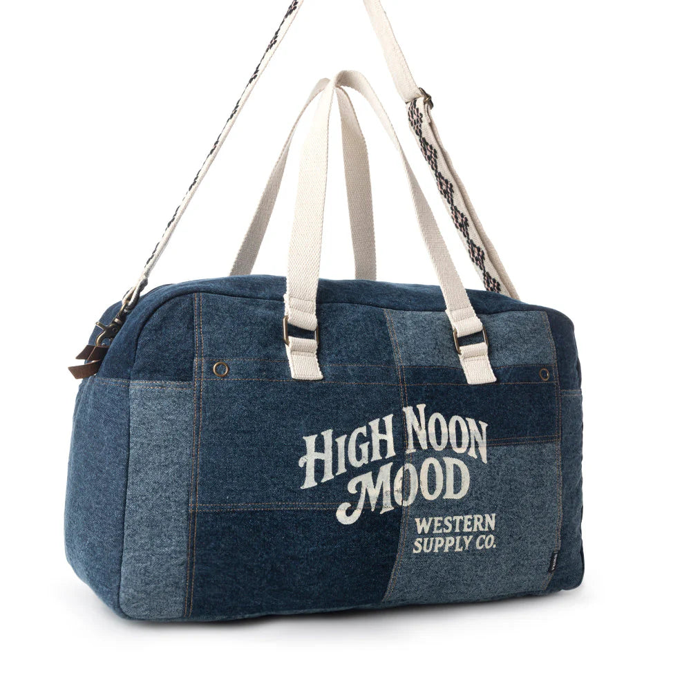 Blue duffel bag with 'High Noon Mood' text on a white background