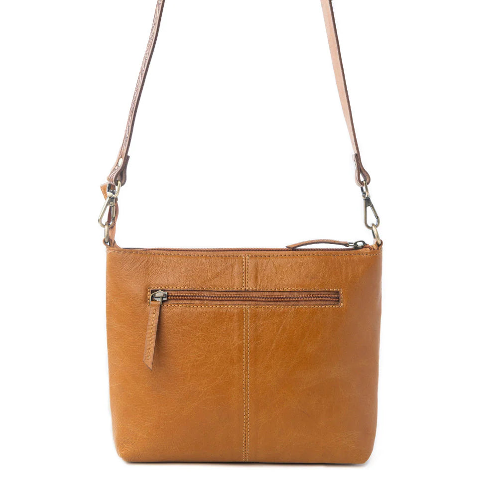 Sienna Grace Handtooled Hairon Leather Bag in Western Copper. Brown leather crossbody bag on a white background