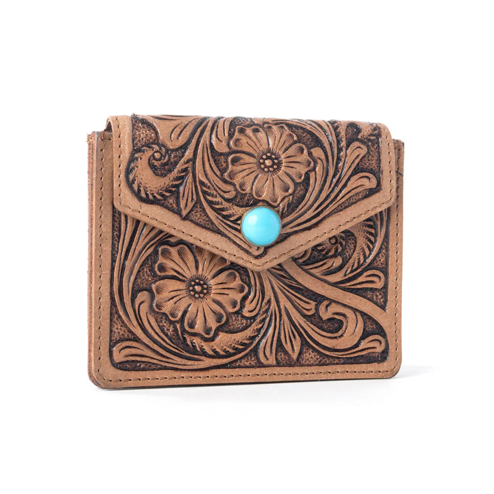 Brown leather wallet with floral patterns and a turquoise stone on a white background