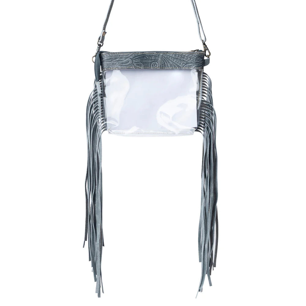 Clear handbag with gray fringe and patterned top on a white background