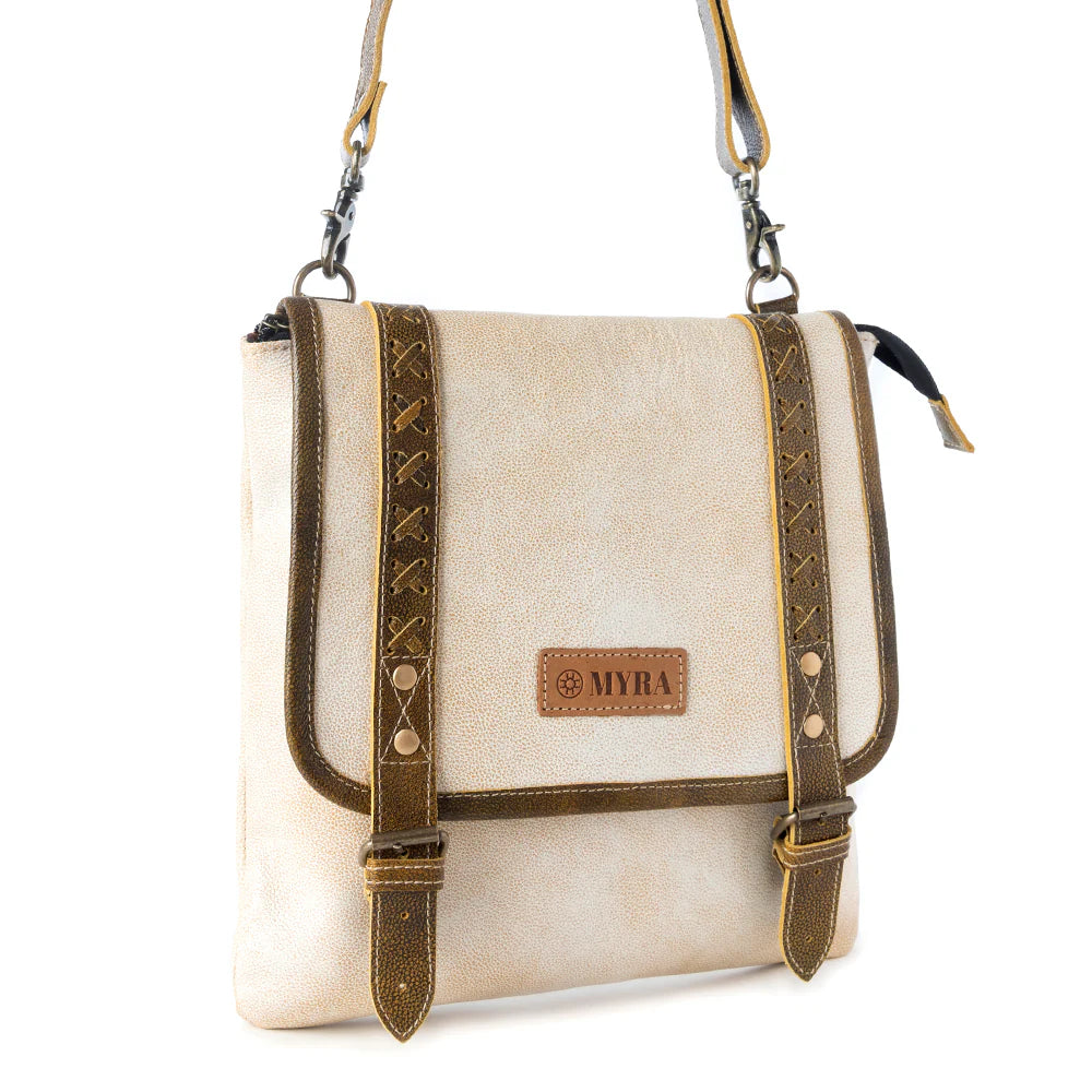 Beige handbag with brown accents and 'MYRA' brand logo on a white background