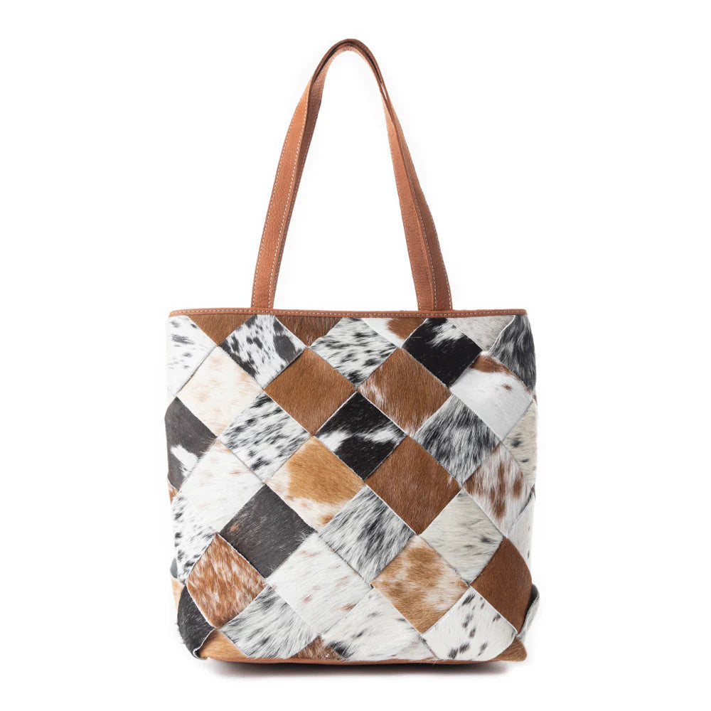 Patchwork tote bag with brown, black, and white pattern on a white background