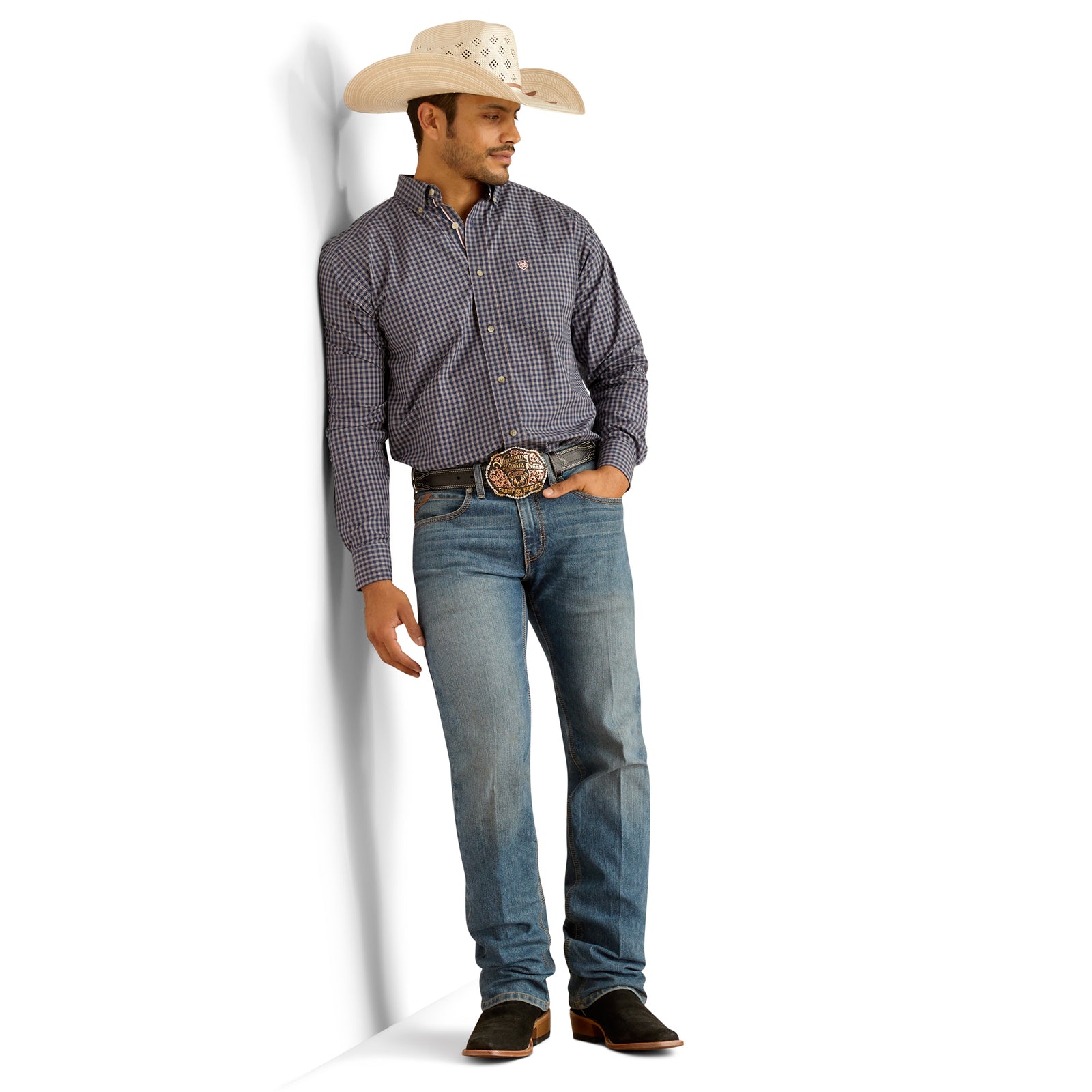 Ariat Men's M5 Performance Pro Rip Straight Leg Jean. Man wearing a checkered shirt, jeans, and a cowboy hat on a white background