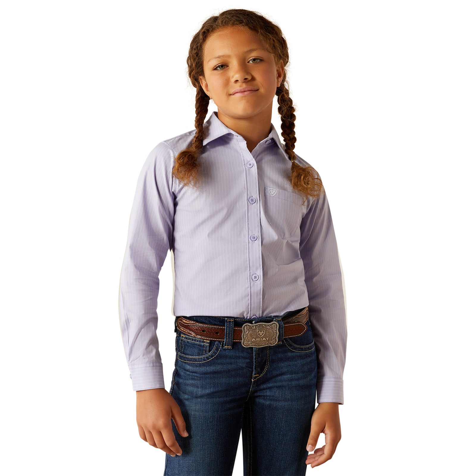 Ariat Girl's Kirby L/S Western Shirt. Young girl wearing a light purple dress shirt and blue jeans on a white background
