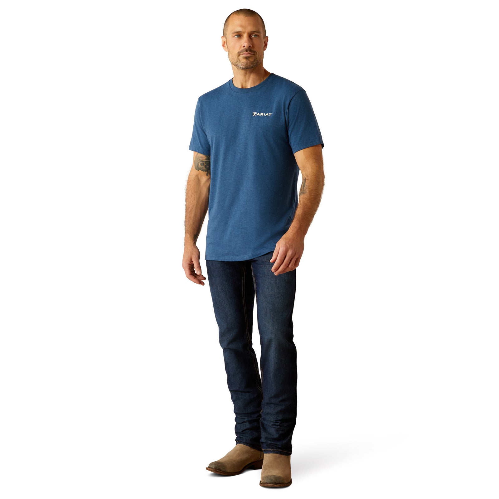 Ariat Men's Line Frame Hex T-Shirt. Man wearing a blue t-shirt and jeans on a white background