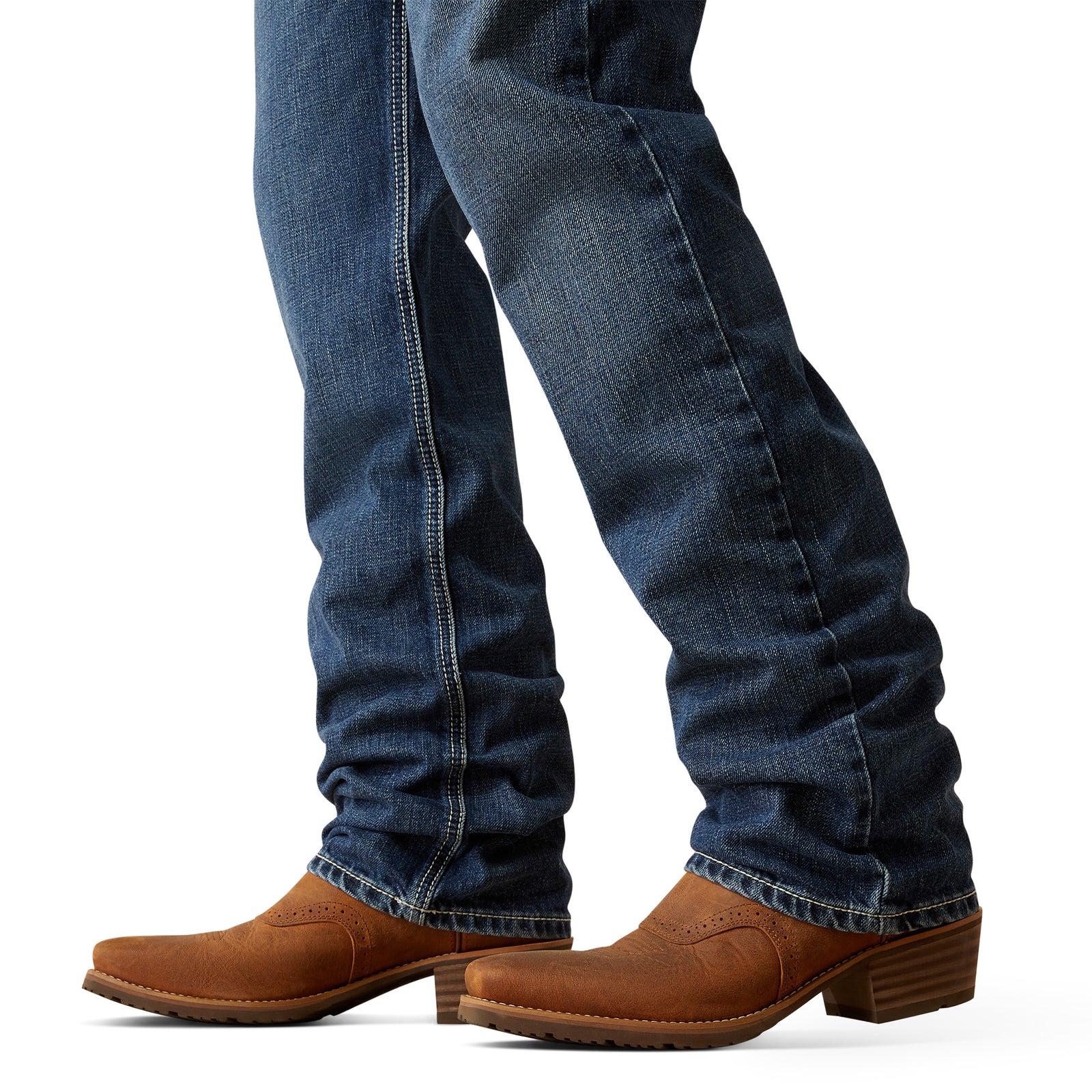 Ariat Men's M2 Camilo Boot Cut Jean. Blue jeans and brown boots on a white background