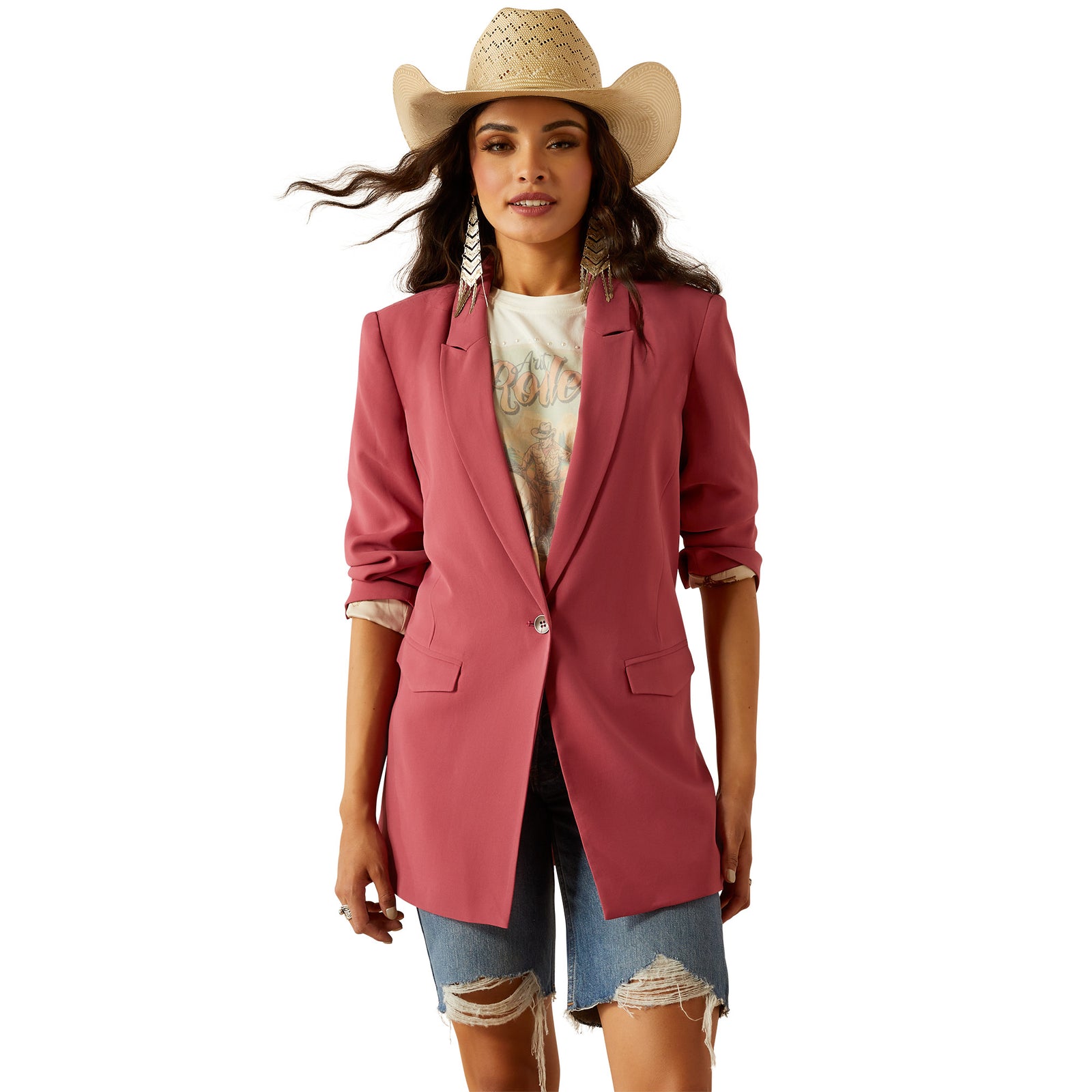 Ariat Women's Ella Blazer. Woman wearing a pink blazer, denim shorts, and a straw hat on a white background