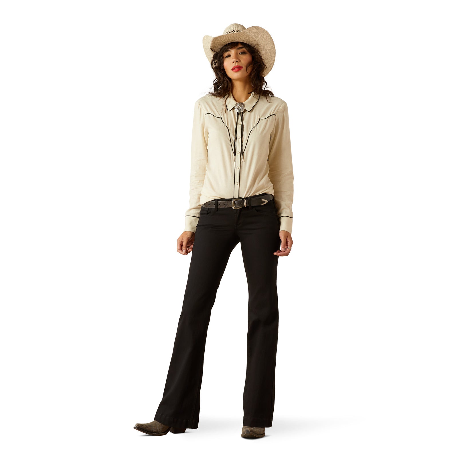 Ariat Women's Bluebell L/S Western Shirt. Woman wearing a beige leather jacket and black pants with a white background
