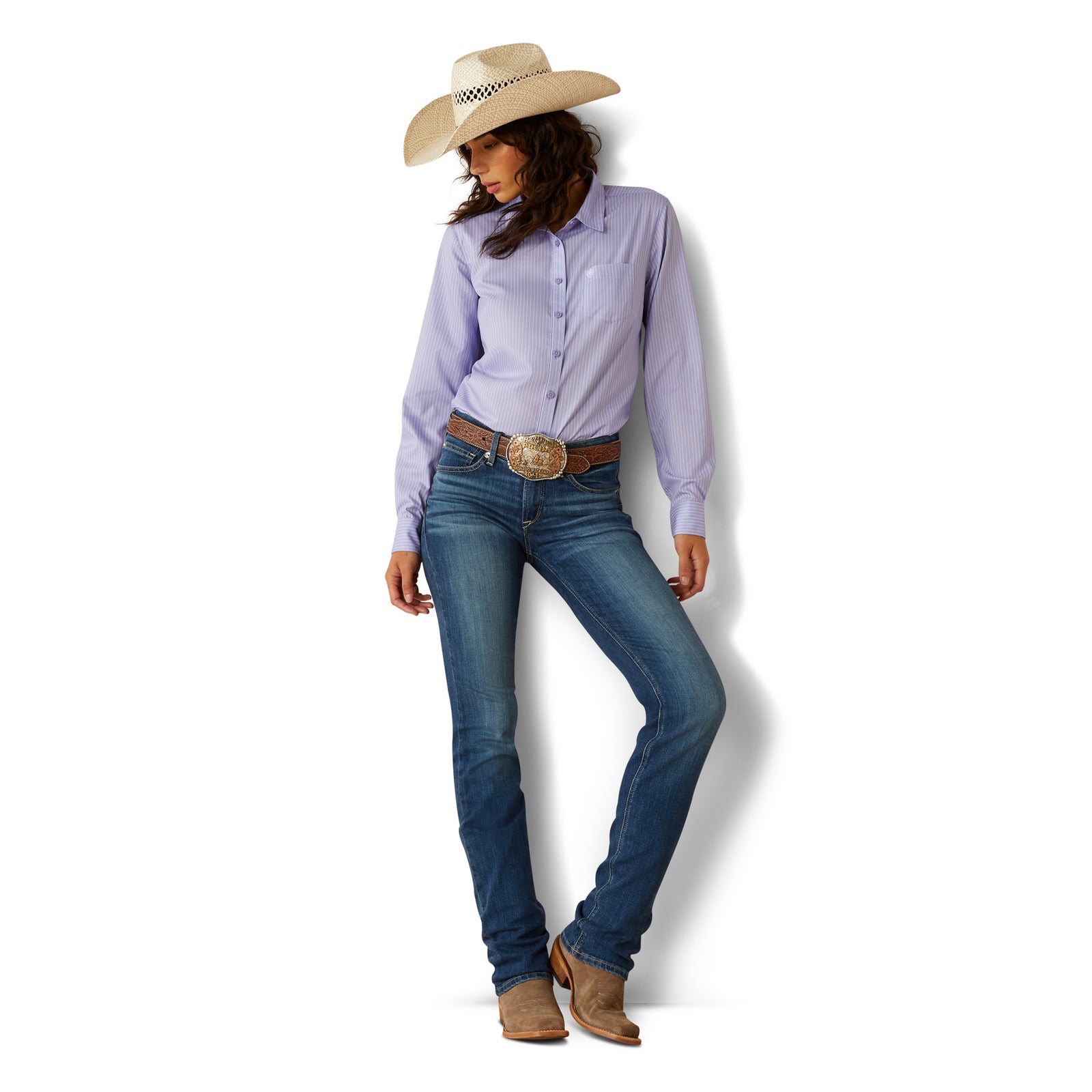 Ariat Women's Kirby Pro L/S Western Shirt. Person wearing a purple shirt, blue jeans, and a cowboy hat on a white background
