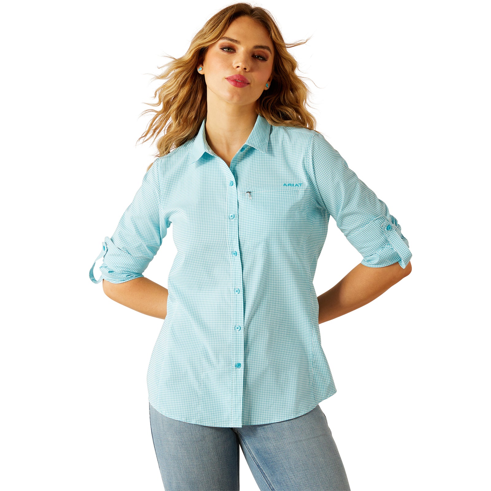Ariat Women's VentTEK L/S Western Shirt. Woman wearing a light blue checkered shirt with a logo on a white background
