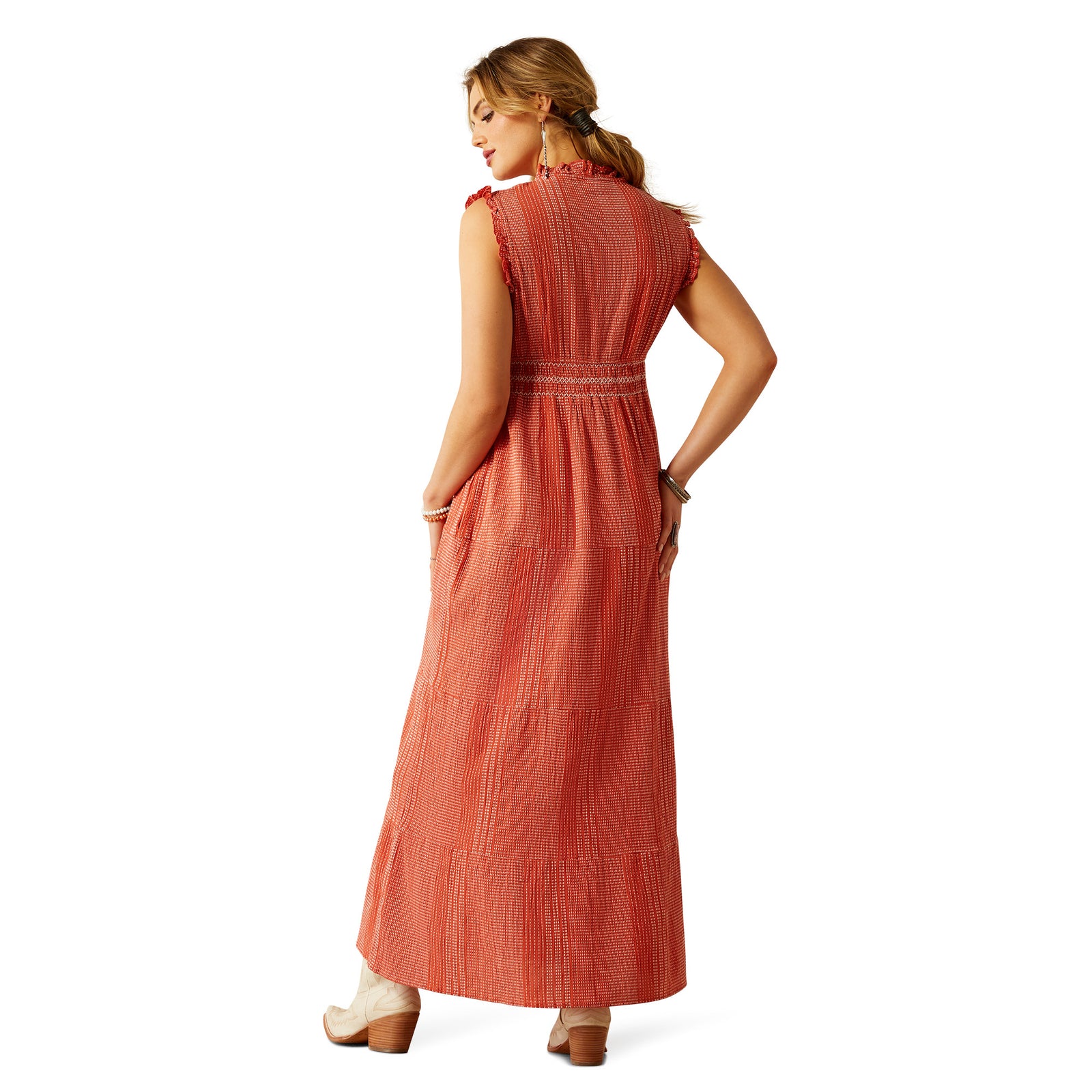 Ariat Women's Sunset State of Mind Dress. Woman wearing a long orange dress on a white background