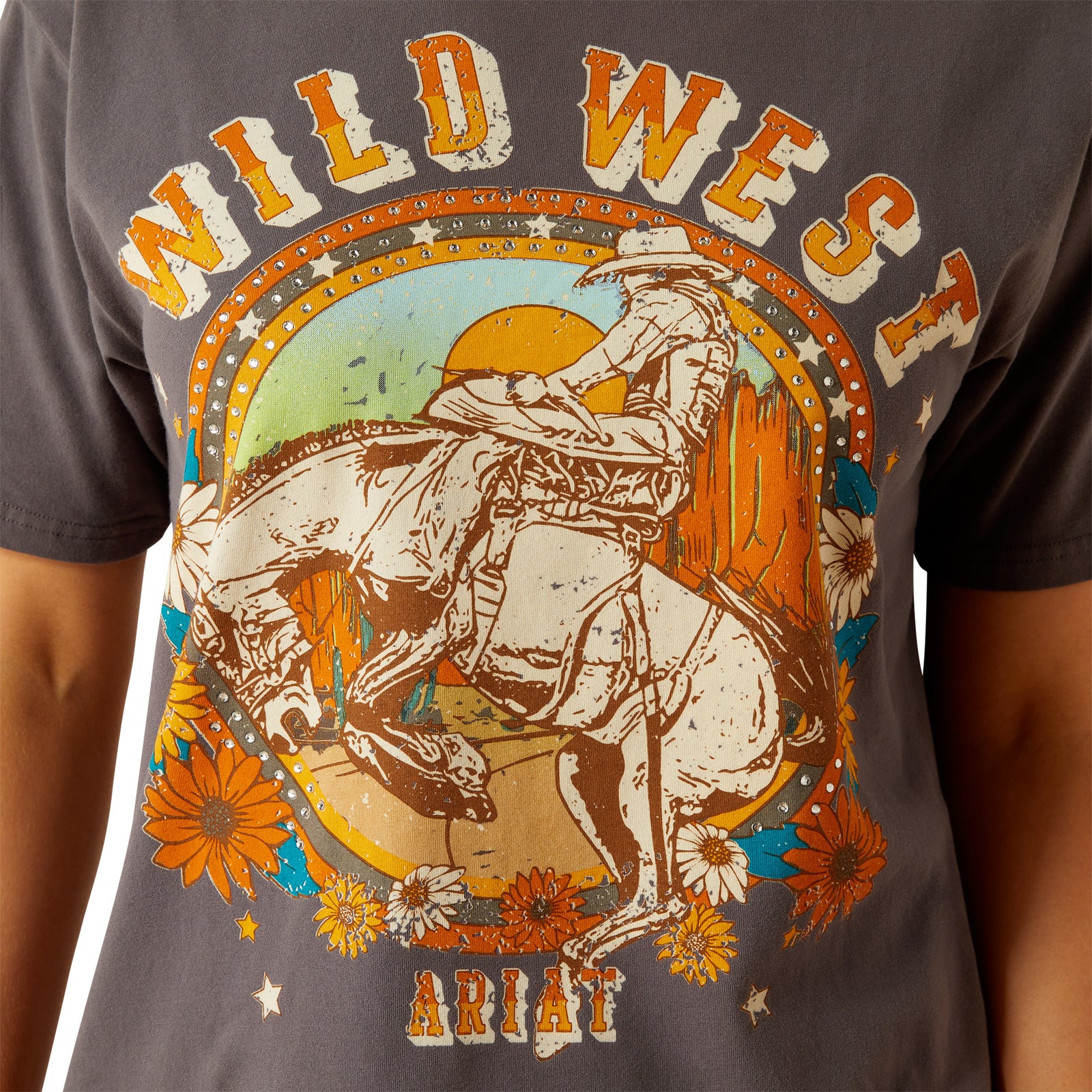 Ariat Women's Retro Rodeo T-Shirt. T-shirt with 'Wild West' and Ariat graphic design on a gray background