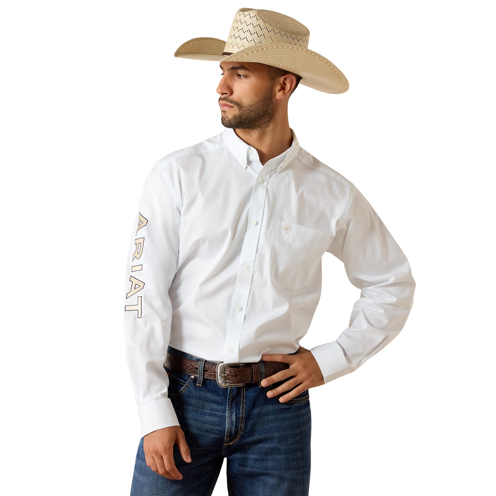 Man wearing a white Ariat shirt, blue jeans, and a straw cowboy hat on a white background