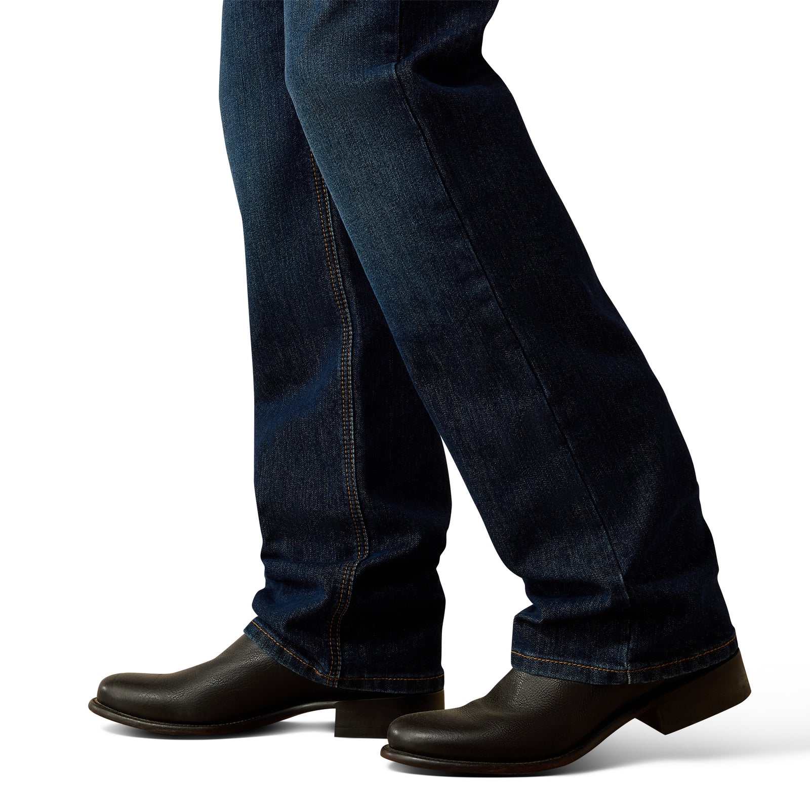 Dark blue jeans and black shoes on a white background