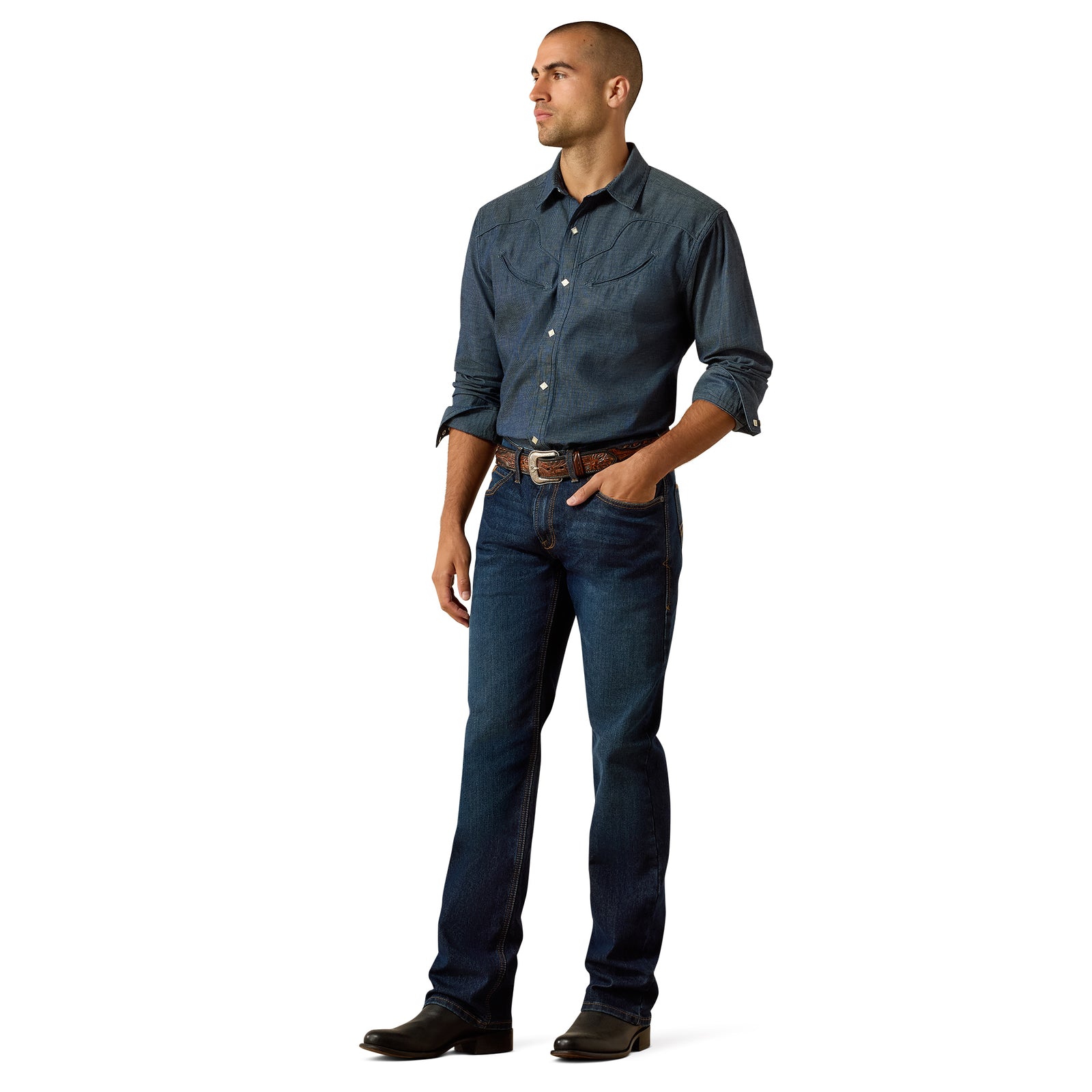 Man wearing a blue shirt and jeans on a white background