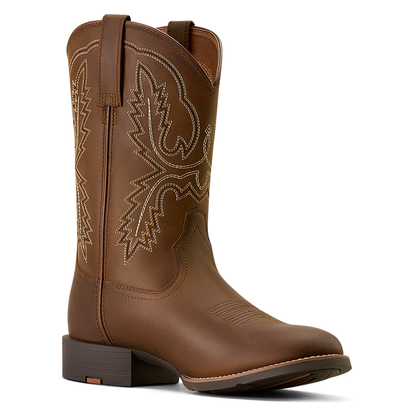 Brown cowboy boot with intricate stitching on a white background