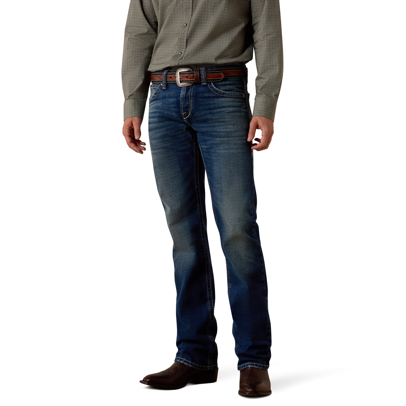 Person wearing blue jeans and a green shirt on a white background