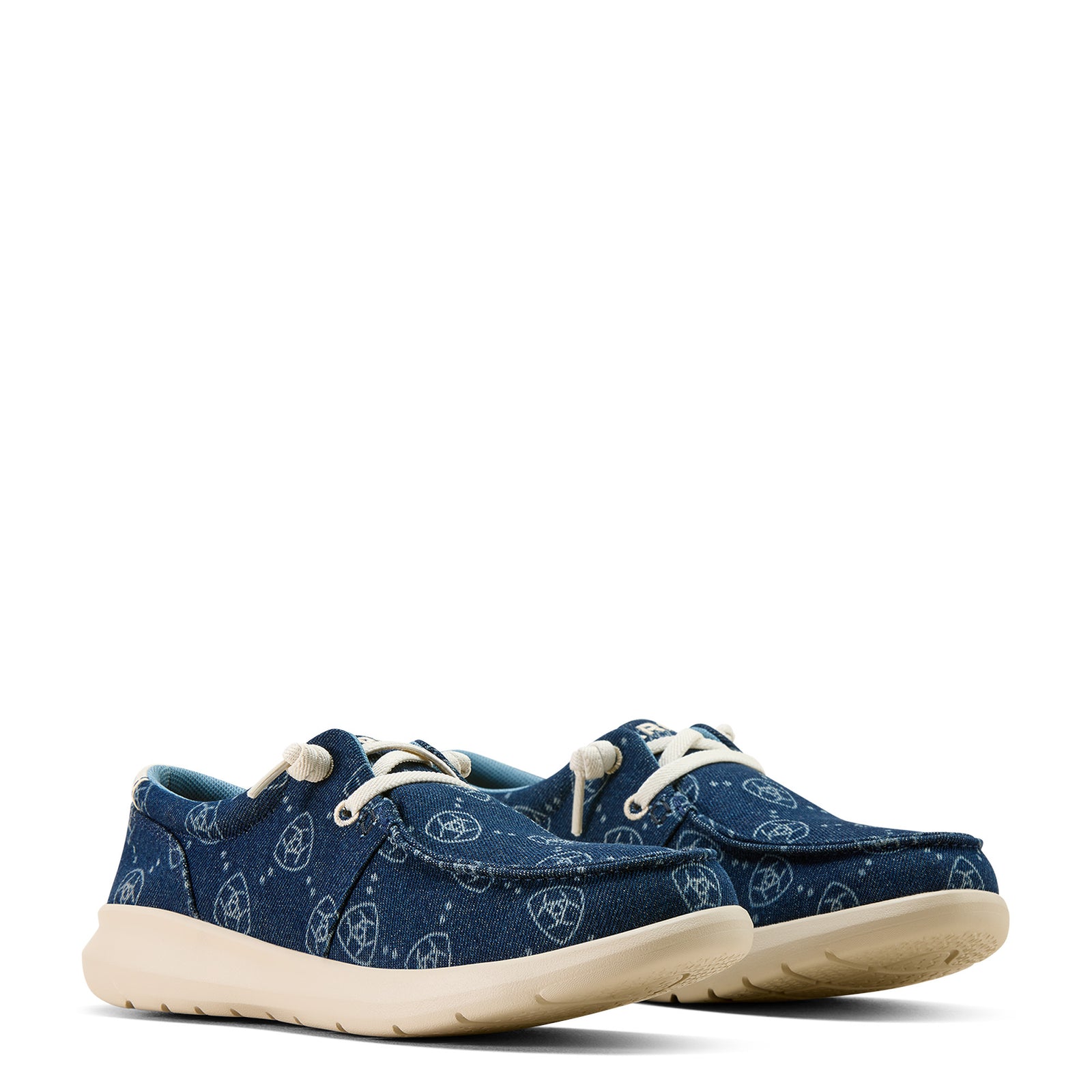 Pair of blue sneakers with white soles on a white background