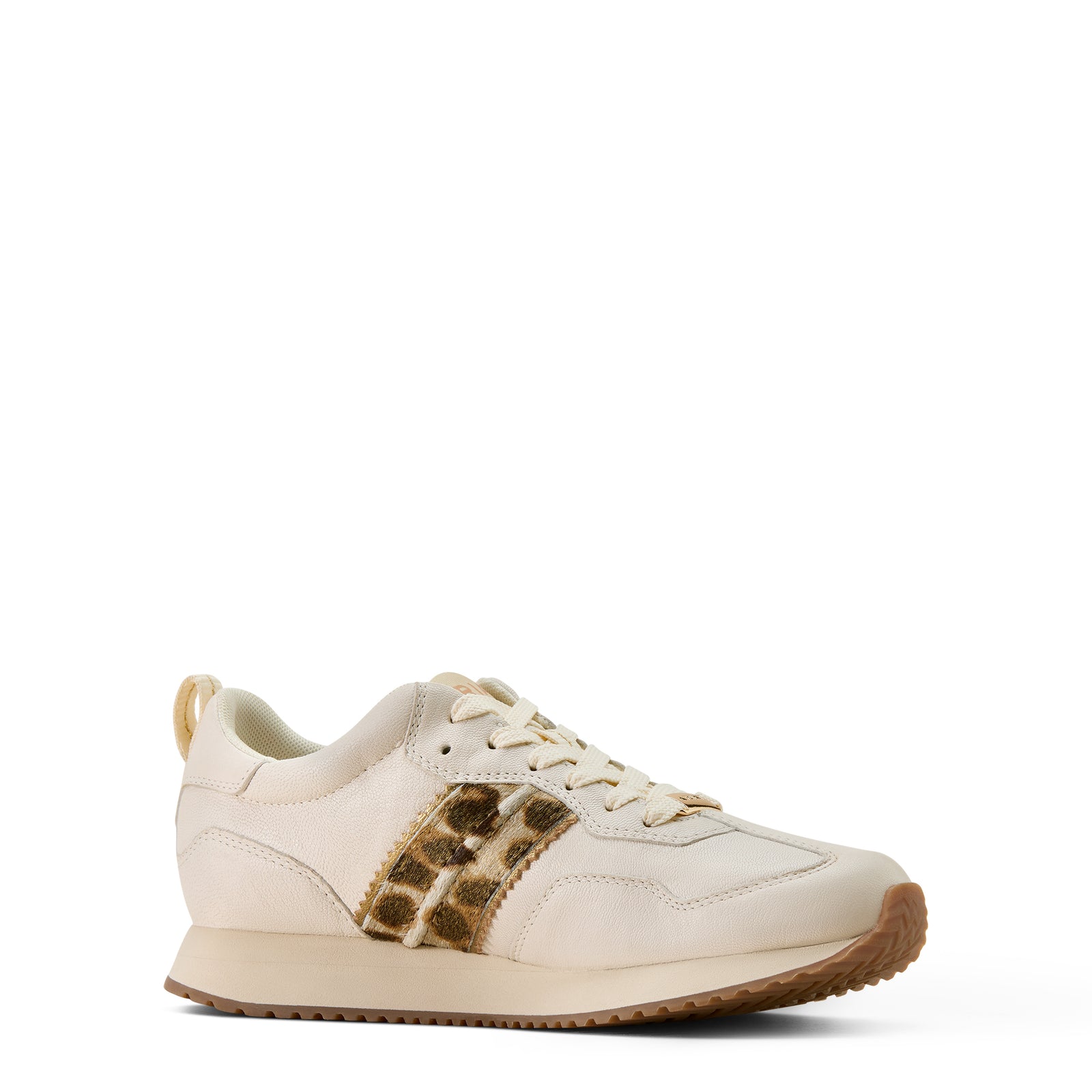 White sneaker with leopard print accents on a white background
