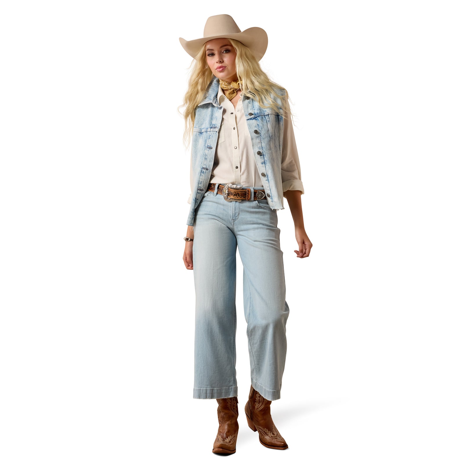 Person wearing a denim jacket, white shirt, light blue jeans, and cowboy hat on a white background
