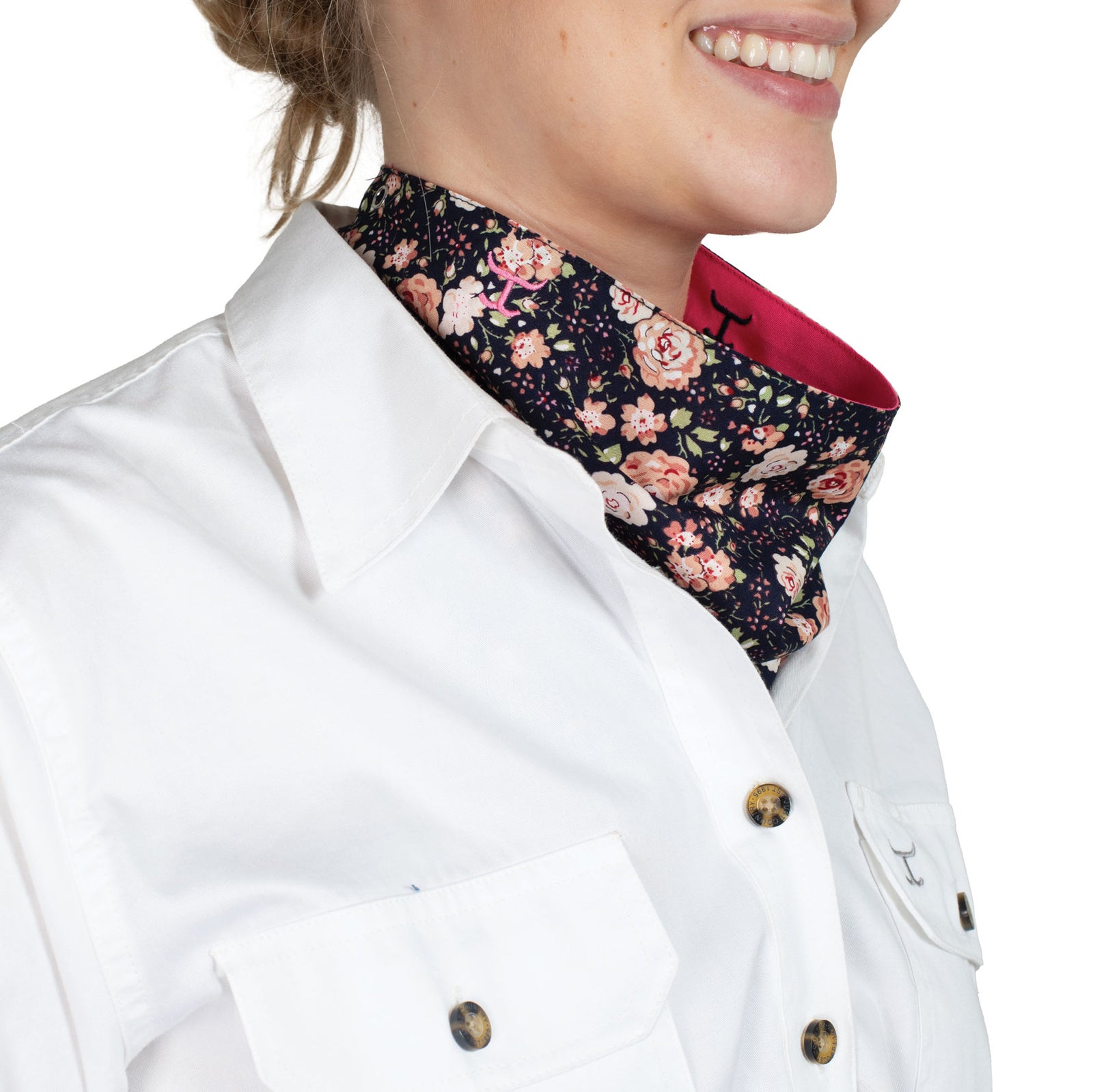 Just Country Carlee Double Sided Scarf. Person wearing a white shirt with a floral patterned scarf around the neck on a white background