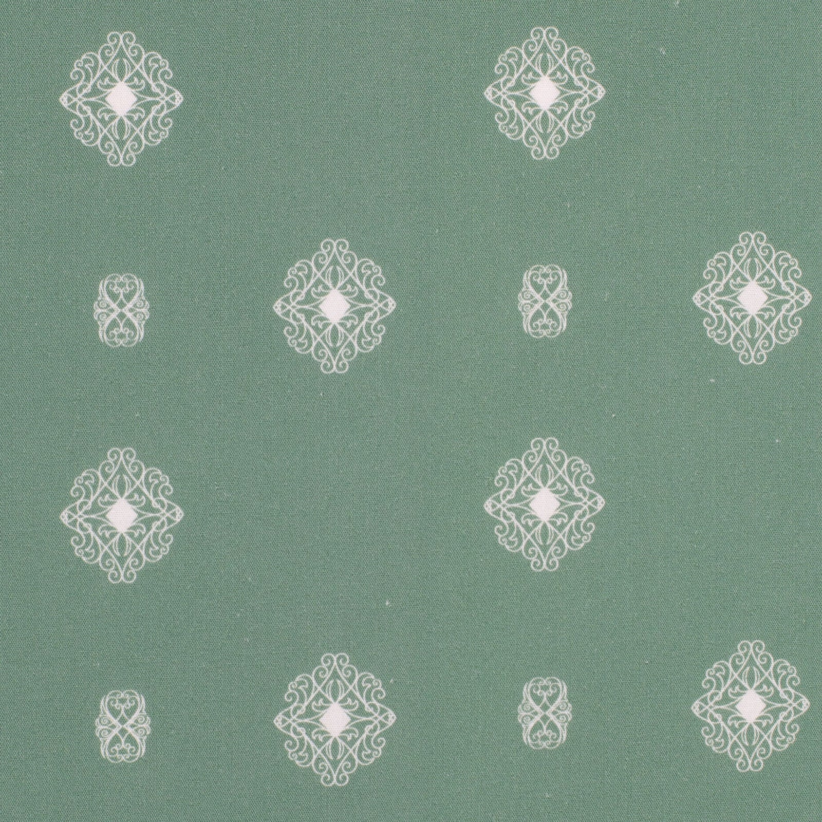 White geometric patterns on a green background