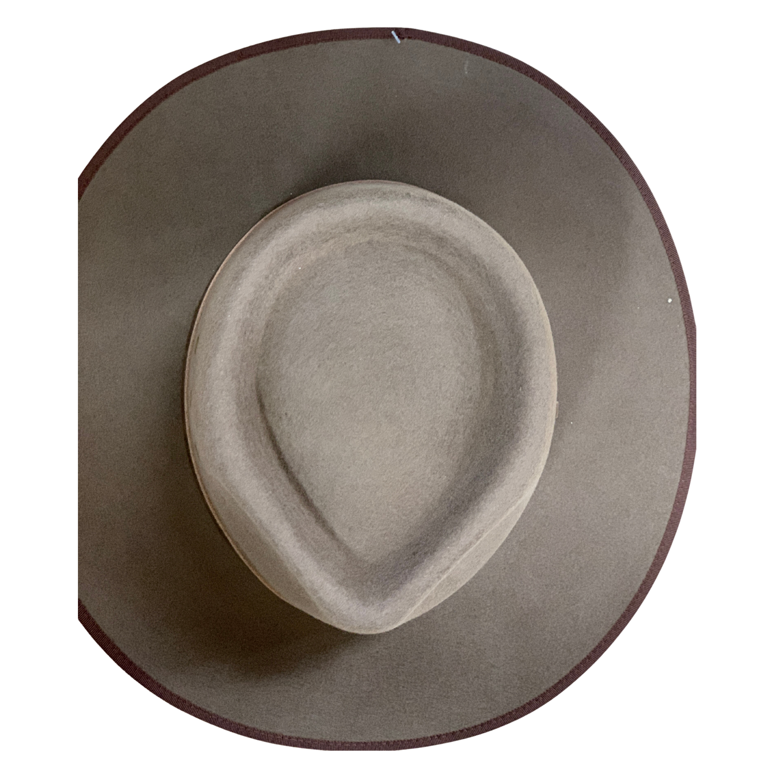 A top-down view of a wide-brim fedora hat in a taupe-gray color with a dark brown rim, shown against a plain white background.