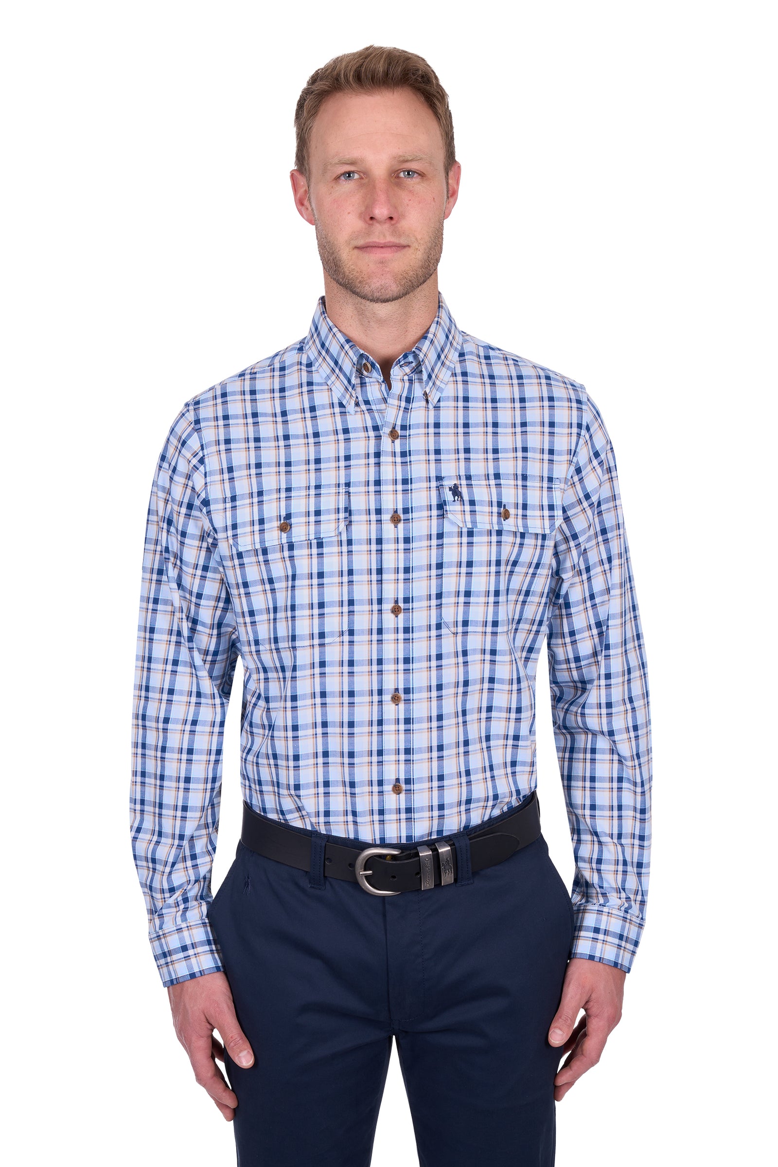 Thomas Cook Men's Thomas L/S Shirt. Man wearing a blue plaid shirt and navy pants on a white background
