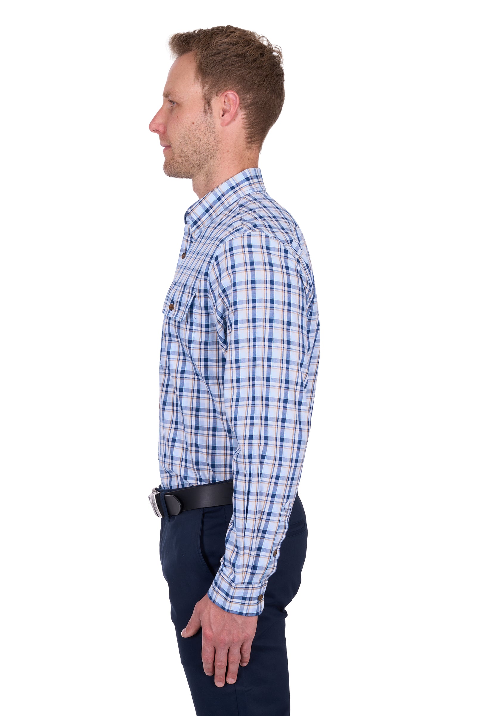 Thomas Cook Men's Thomas L/S Shirt. Man wearing a blue checkered shirt and dark pants on a white background