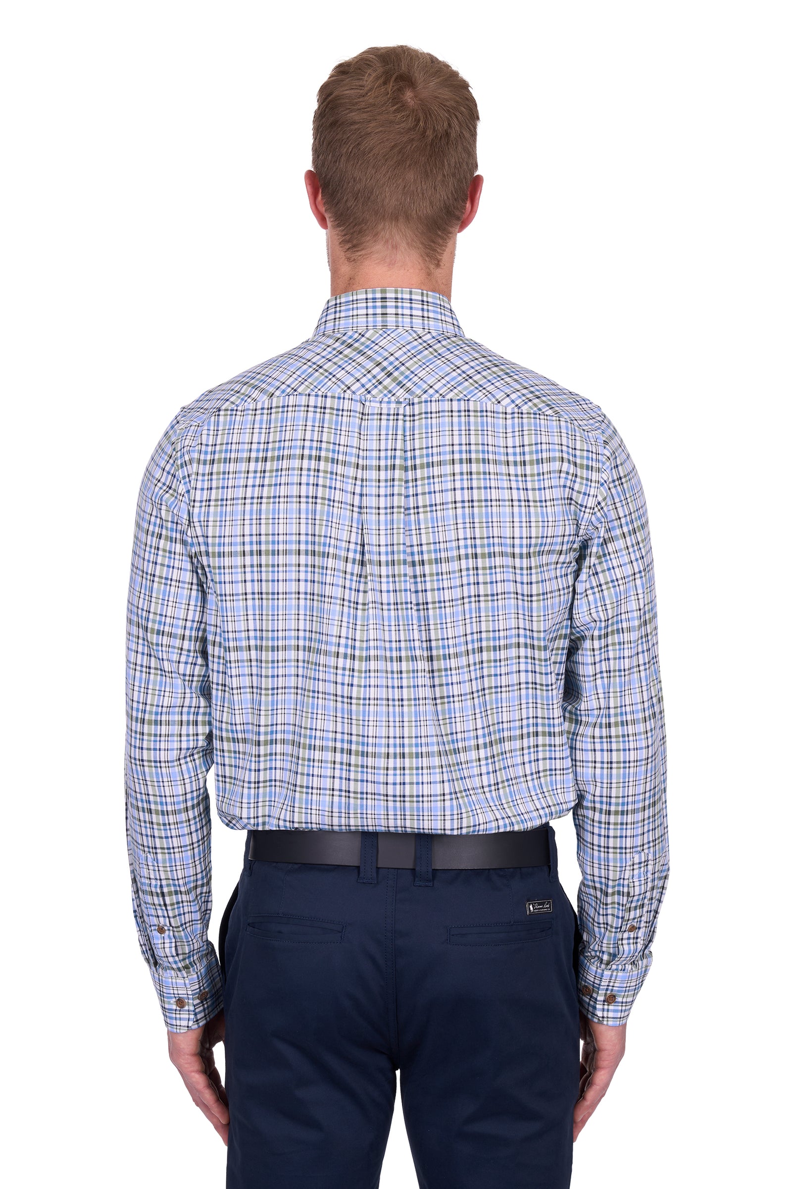 Thomas Cook Men's Eric L/S Shirt. Man wearing a blue plaid shirt and dark pants on a white background