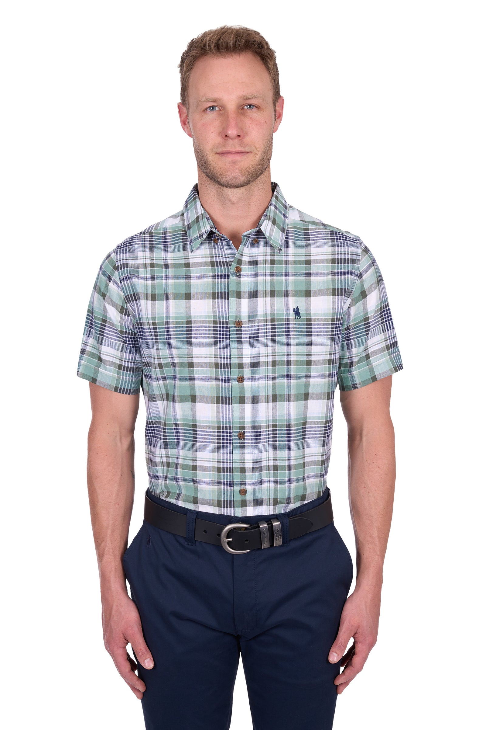 Man wearing a Thomas Cook Men's Gerry Linen S/S Shirt. Green and navy plaid shirt and navy pants on a white background