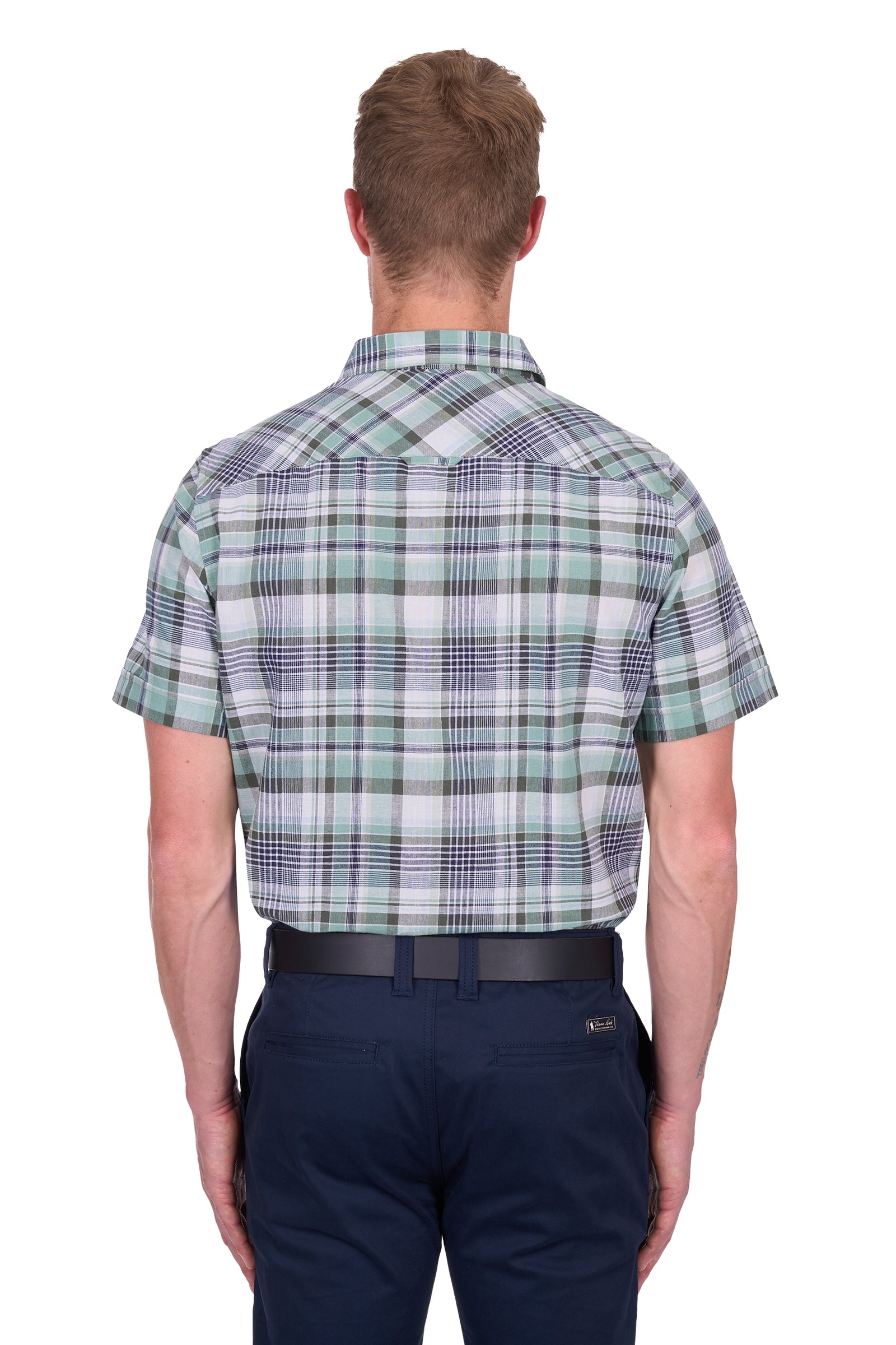 Rear view of a man wearing a Thomas Cook Men's Gerry Linen S/S Shirt. Green and navy plaid shirt and navy pants on a white background