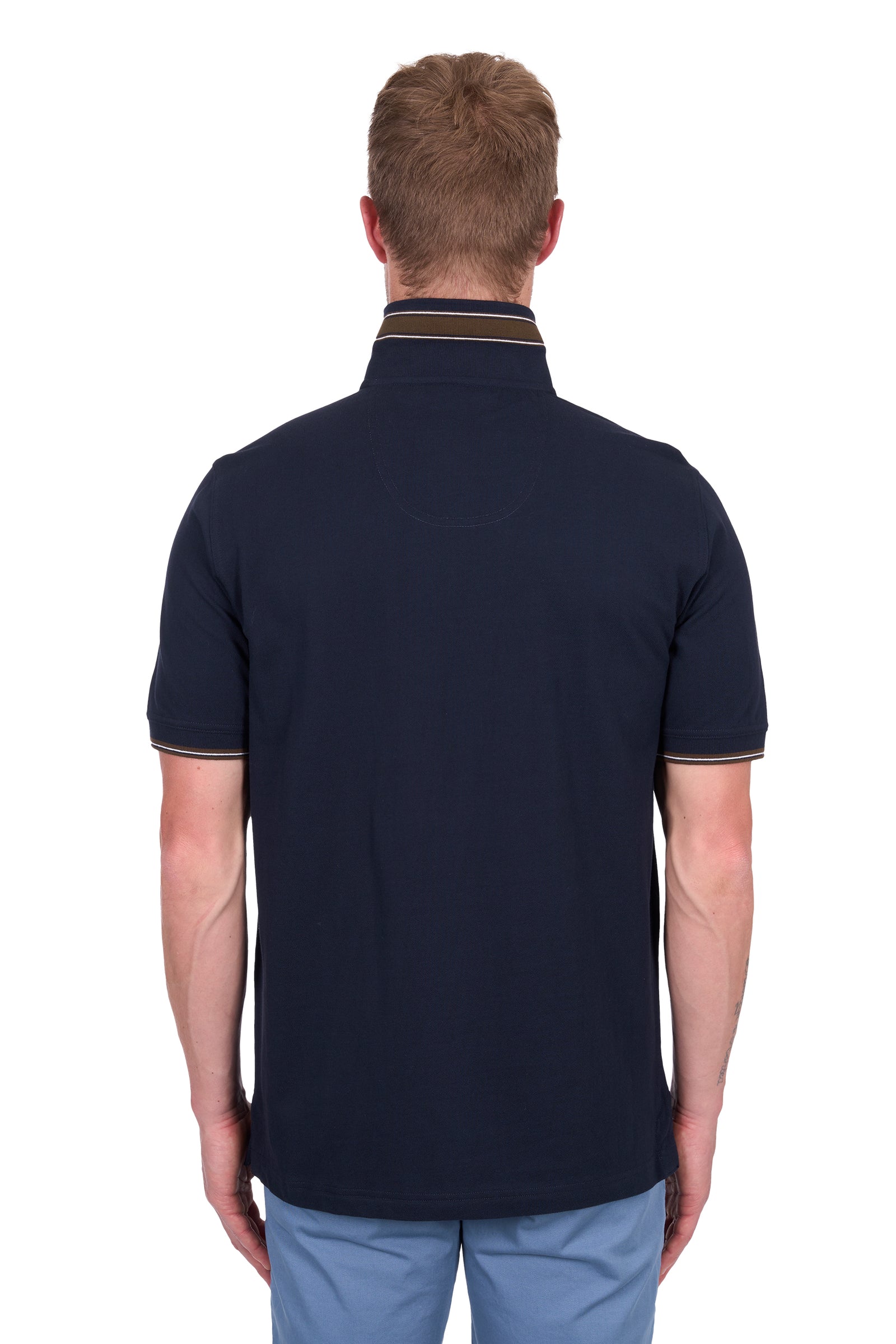 Rear view of a man wearing a Thomas Cook Men's Ben Tailored S/S Polo. Navy polo shirt with a zipper pocket on a white background