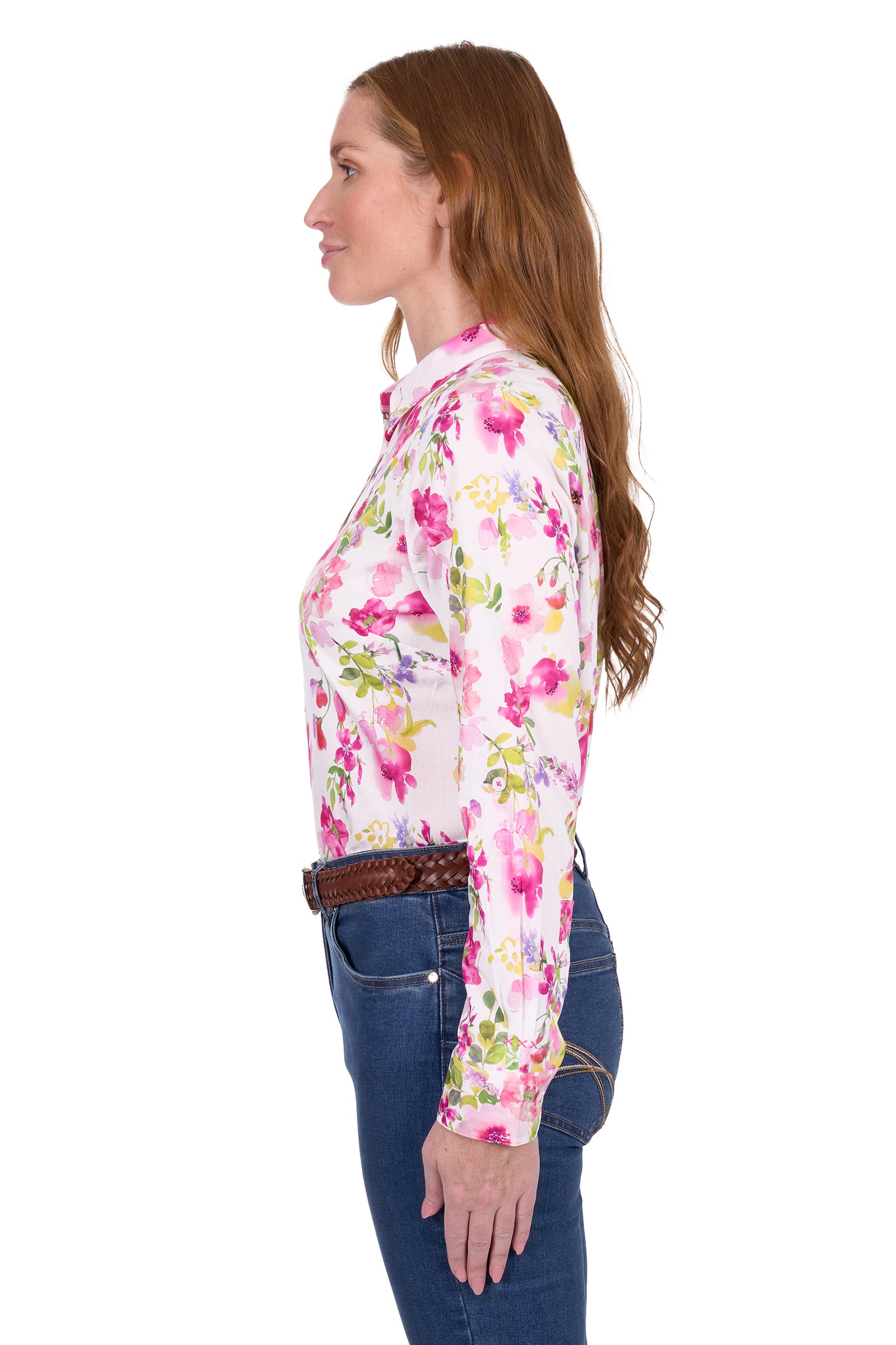 Thomas Cook Women's Mila L/S Western Shirt. Woman wearing a floral shirt and jeans on a white background
