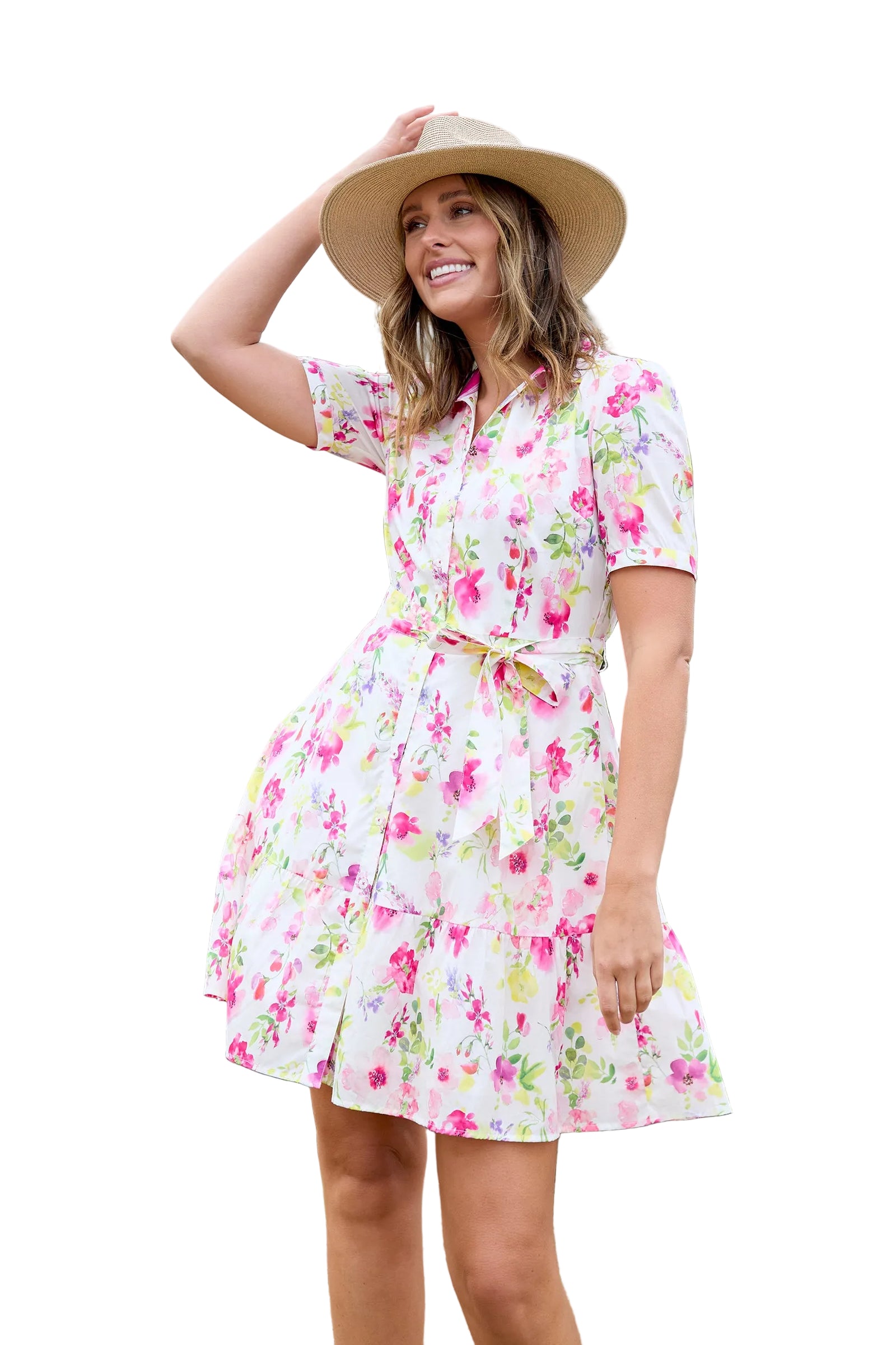 Thomas Cook Women's Flora S/S Dress. Woman wearing a floral dress and hat outdoors