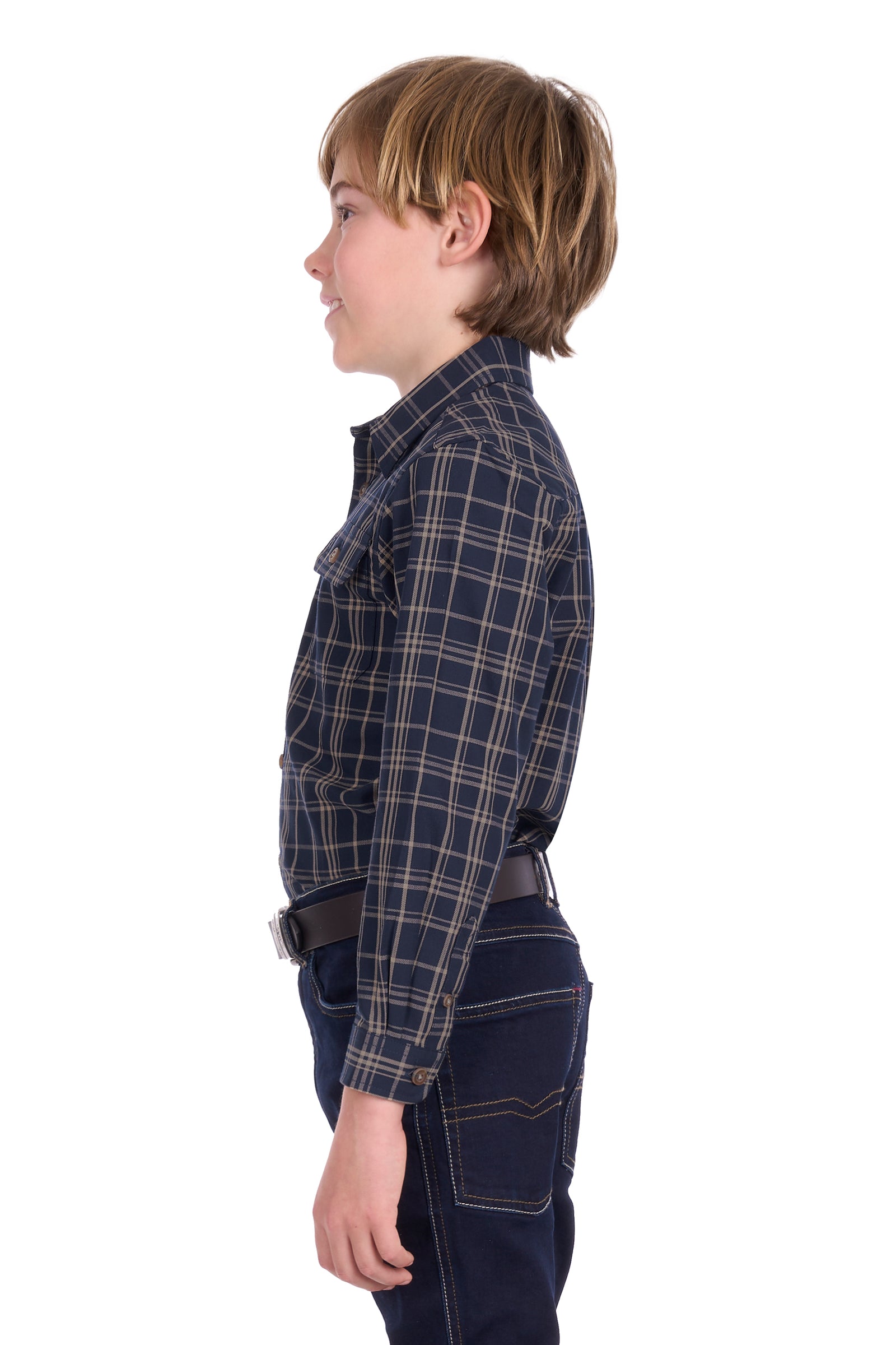 Child wearing a plaid shirt and dark pants on a white background