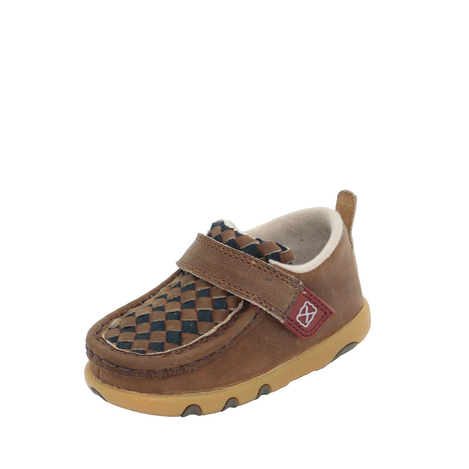 Twisted X Infants Weave Barb Casual Mocs. Brown children's shoe with a checkered pattern on a white background