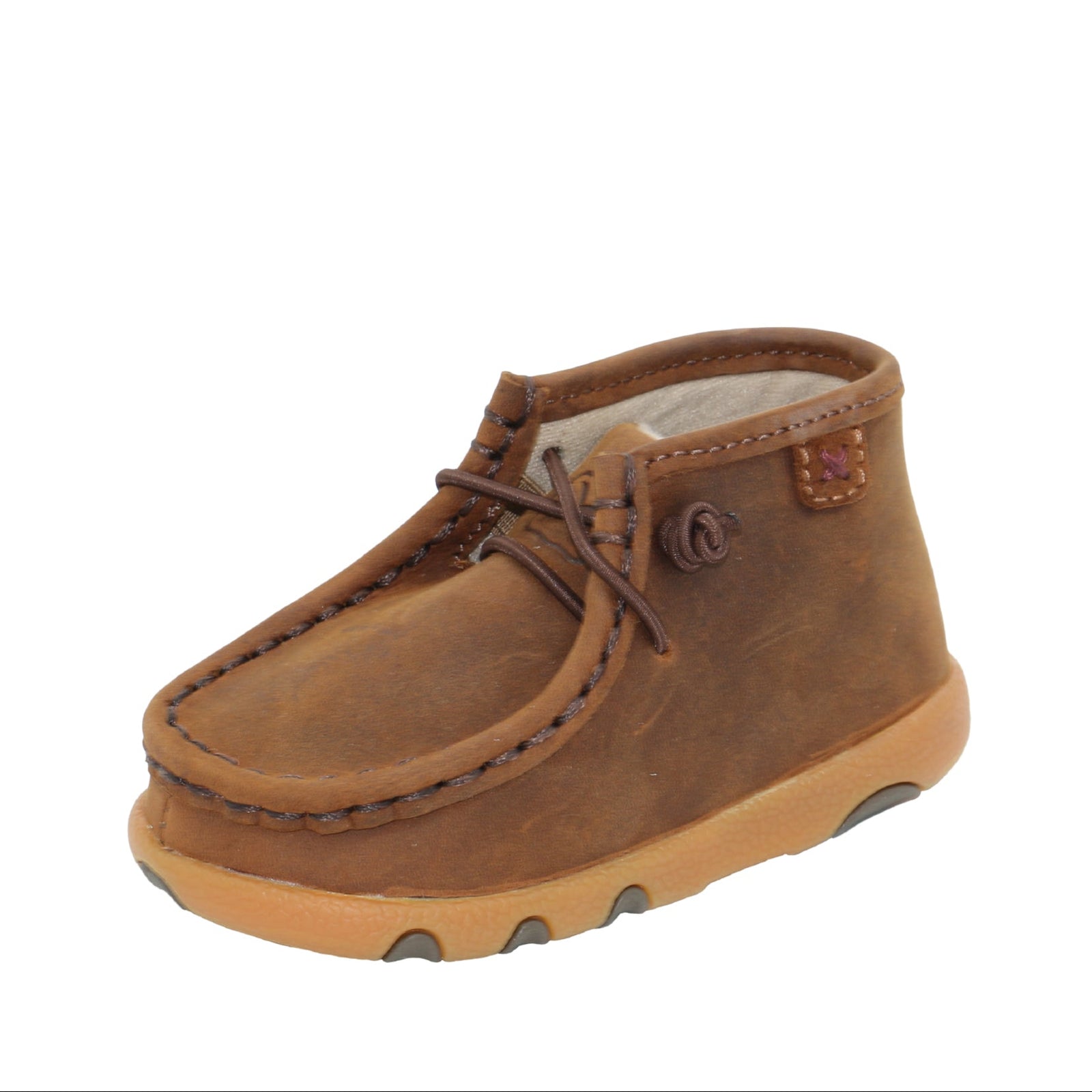 Brown children's shoe on a white background