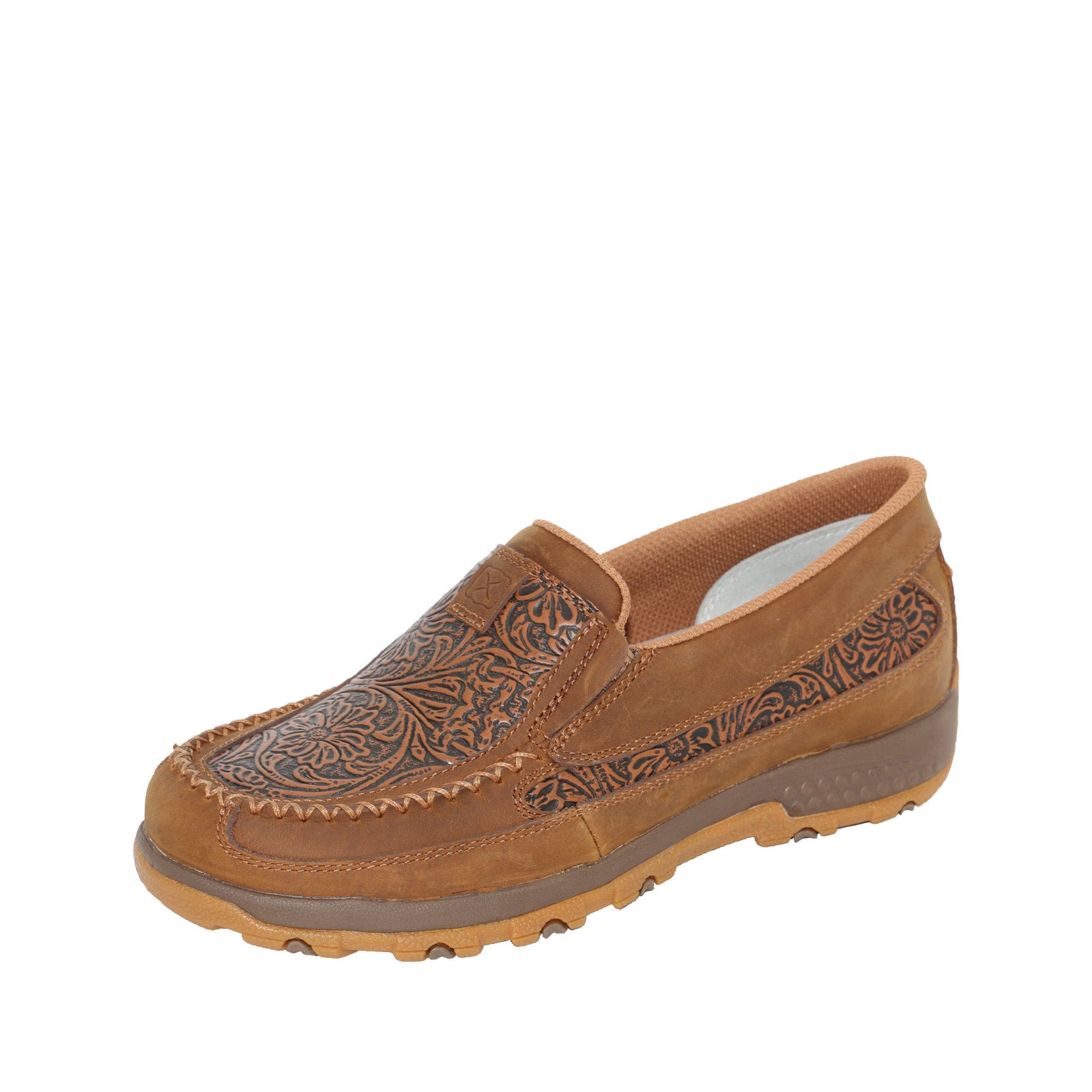 Twisted X Women's Tooled CellStretch Mocs Slip On. Brown slip-on shoe with decorative patterns on a white background