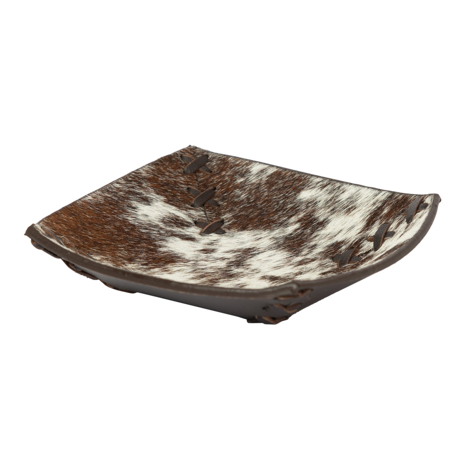 Square dish with brown and white cowhide pattern on a white background