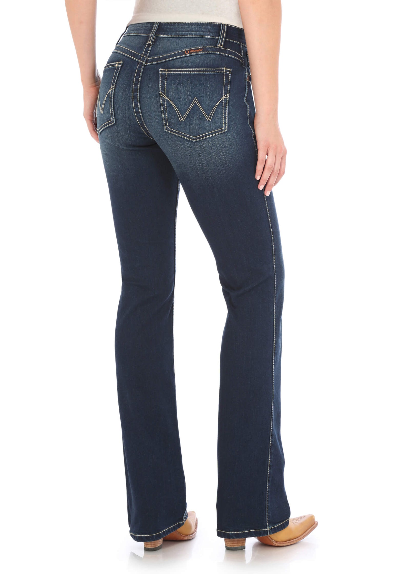 A rear view of a woman wearing Wrangler Women's Q-Baby Ultimate Riding Jean, showing a mid-rise waist and boot cut design.
